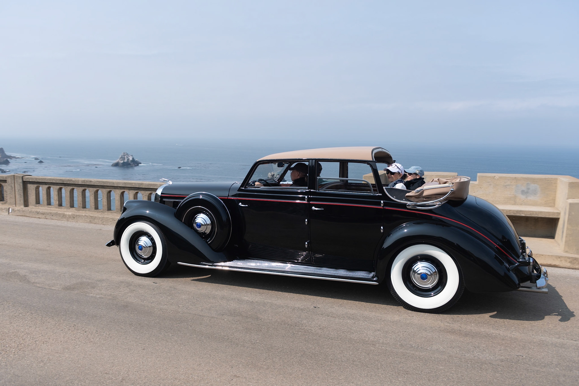 The first Lincoln K V12 with Brunn Touring Cabriolet coachwork was that of Herman Brunn himself. This body style was then offered in the Lincoln catalog in 1937, ’38 and ’39. Ten of these luxurious motorcars were built in 1937, and they were at the time the most expensive Lincoln cars ever made. This cabriolet has several interesting features, including a roof with tinted glass skylights above the windshield in order to see traffic lights more easily as well a convertible rear section that folds down so the rear passengers can get some sun. Inside, a hand-cranked divider window separates the driver from the passengers. In 1939, a similar Lincoln K V12 with fully convertible phaeton coachwork was offered by Edsel Ford for the use by King George VI and Queen Elizabeth when they visited the United States and Canada.