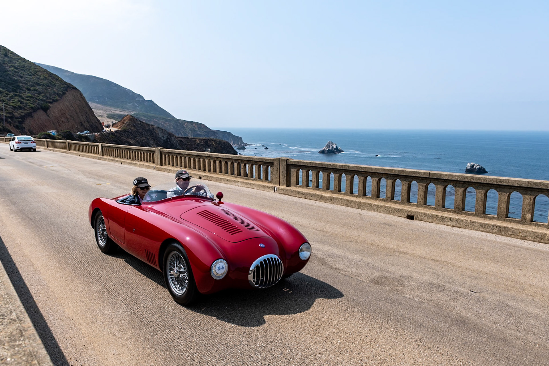 By 1953 the Maserati brothers had increased the capacity of their engines in order to compete with the new Porsche 550 in the 1500 cc and 2-liter classes. Among other improvements, the revised OSCA 2AD engine was fitted with a new double-overhead-cam head and twin side-draft DCO Weber carburetors. The new head made all previous OSCA engines almost obsolete, and many were returned to the factory to be modified. This OSCA MT4 2AD (chassis 1133) was the first MT4 built with the new 1450 cc motor, and it is one of only three OSCA spiders built with an aluminum body by Carrozzeria Frua. It also happens to be one of the most successful OSCAs ever raced in North America. It was first owned by Jim Simpson who, with teammate George Colby, finished fourth overall and second in class behind Stirling Moss in the 1954 Sebring 12 Hours race. Simpson later sold the car to Jim Kimberly, and the MT4 2AD continued to win. In the mid-1990s the car was partially restored.