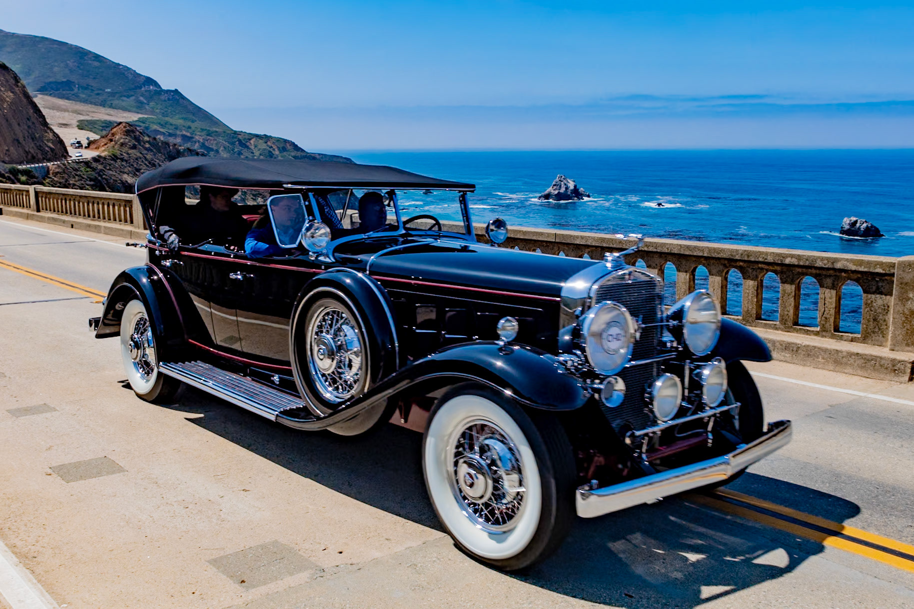 Cadillac introduced its new and luxurious V-16 automobile at the 1930 New York Salon in response to the Duesenberg Model J that had amazed the world when introduced in late 1928. The V-16 had an equally impressive performance, displacing 452 cubic inches and producing 185 bhp. Only 85 Fleetwood sport phaetons were produced on the V-16 chassis and today these cars are extremely rare. This example is fitted with attractive dual cowl coachwork; the cowl for the rear-seat passengers is mounted directly to the rear of the front seat and is raised and lowered by turning a small crank. This gives the car its distinctive low line. The body is sometimes referred to as a four passenger roadster.