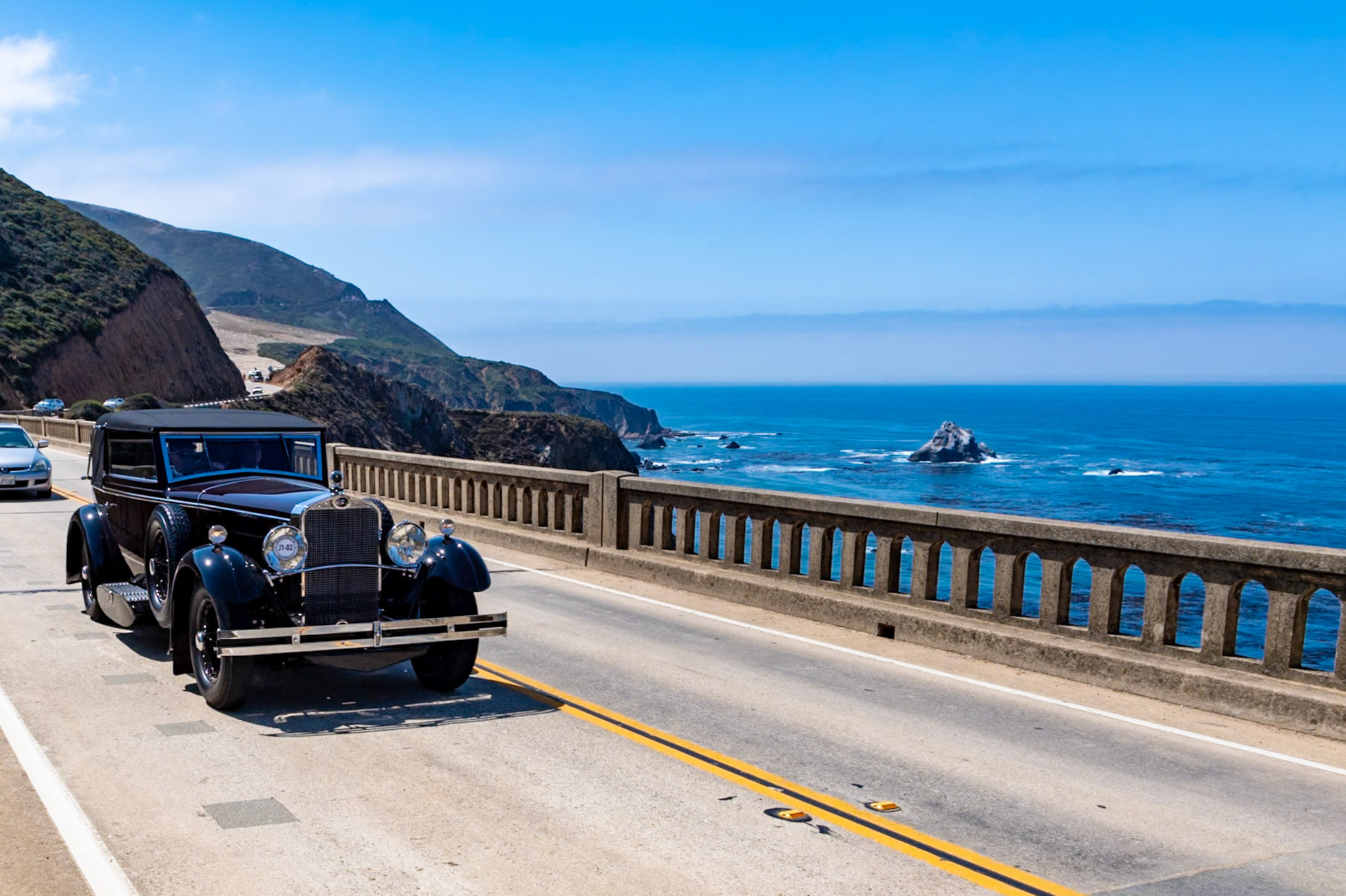 The Delage D8 was produced between 1929 and 1939. Models included the D8C Normale and the D8S, featuring a more powerful engine on a shorter chassis. This automobile is a D8C Normale but with the uprated D8S engine. Maurice Gaultier designed the smooth straight-eight, 4-liter engine, and Henri Chapron created the Cabriolet body. Chapron was famous for his understated style and exceptional build quality, and this is the only Chapron-bodied D8C known to survive. Details include Marchal headlights, pontoon-style running boards containing tools, and crenulated door handles as well as curved taillight supports. The interior of the Delage features Jaeger instruments set into a dash made of rosewood, which continues onto the door surrounds.