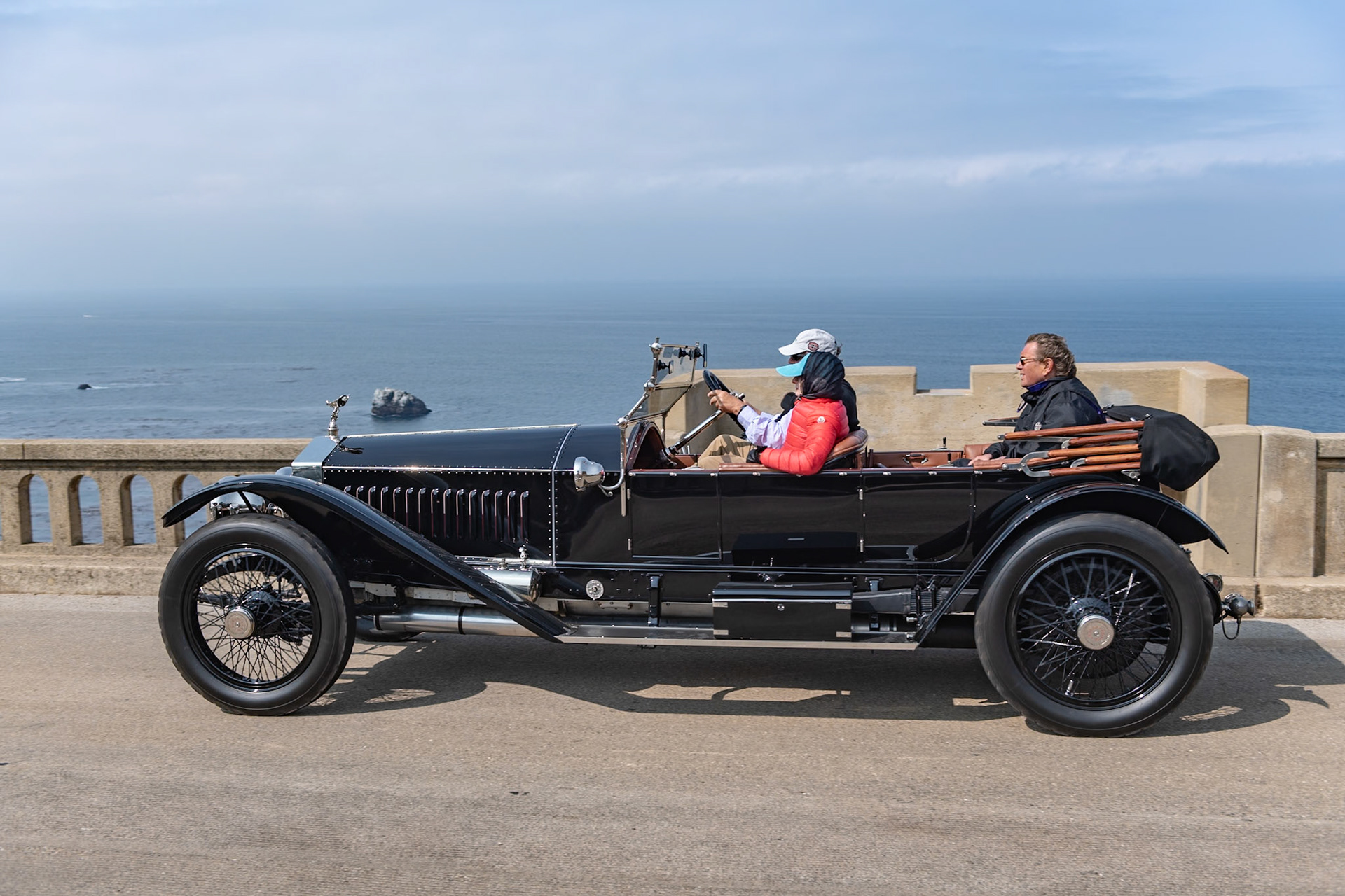 Rolls-Royce introduced the 40/50 HP model, later called the Silver Ghost, in 1907. In 1911, one of its main rivals, Napier, challenged Rolls-Royce to an endurance trial driving from London to Edinburgh, a distance of over 800 miles on largely unpaved roads. A Silver Ghost Holmes Tourer won the contest, establishing the model’s reputation as “the best car in the world.” Rolls-Royce subsequently introduced its sporty London to Edinburgh chassis with underslung, semi-elliptical rear springs allowing its body to rest much lower. Lightweight coachwork was usually specified for these chassis. This particular Silver Ghost (chassis 2015), the twenty-second built to this specification, was first delivered to the Marquis de Linares in Paris. It was later sold to a Spanish owner and its original body was lost. Today the car has been fully restored in its original style.