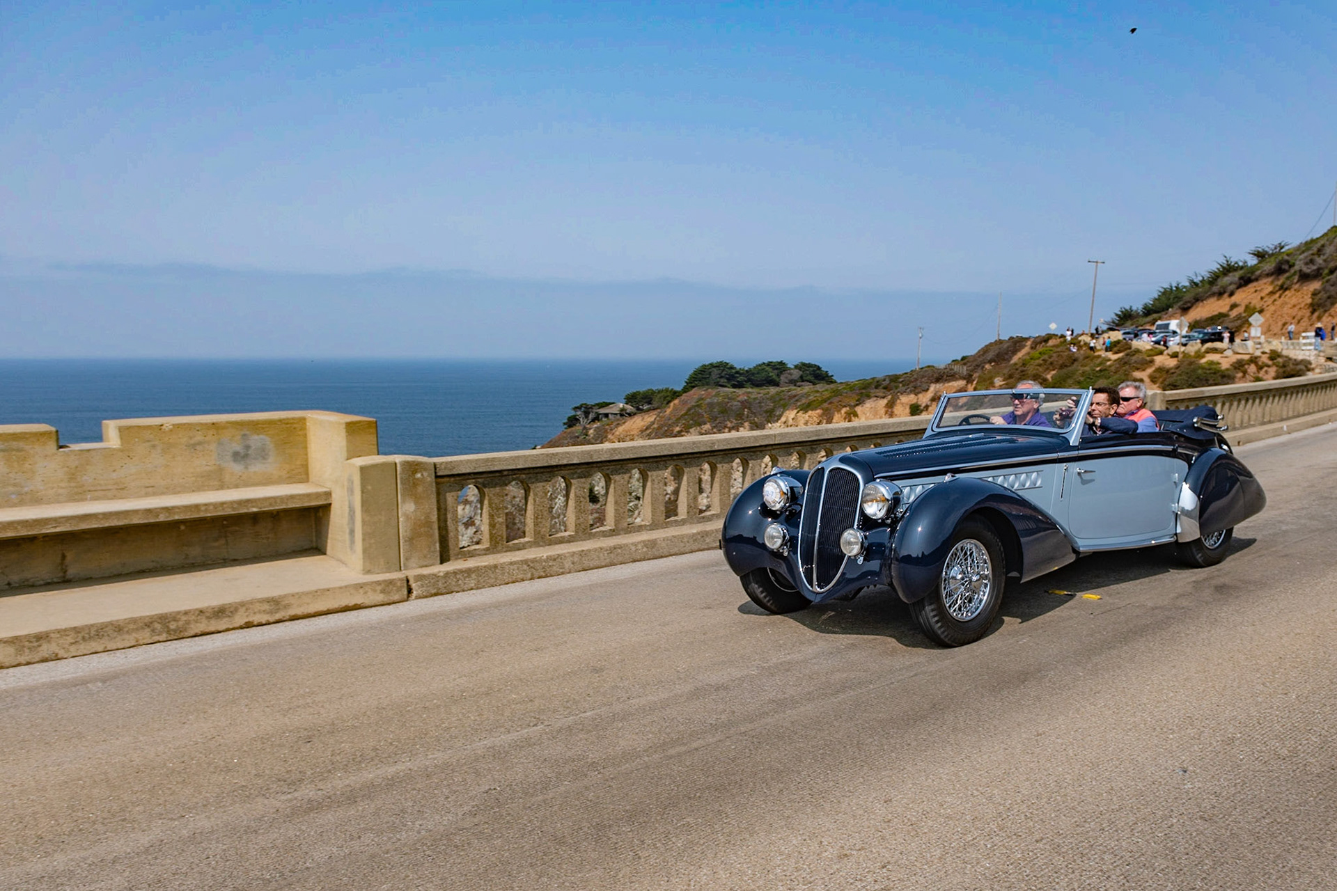 The Delahaye 135 M (Modifie) was based on the original Delahaye 135 first shown in 1935. Combining luxurious bodywork with Delahaye’s race-winning engineering, the Delahaye 135 M is one of the most desirable cars from the prewar era. This 1937 Delahaye 135 M Convertible Coupé (chassis 48700) is from the French Carrosserie Henri Chapron. Built on Delahaye’s shorter competition chassis, it has a 95-hp 3.5-liter engine fitted with triple Solex carburetors. The sporty body with its sharply raked one-piece windshield sits low to the ground and features beautifully sculpted teardrop fenders accented by round vents on the side of the hood and a chrome beltline moulding that extends from the radiator surround back through the doors before falling smoothly off at the tail. The car has just been restored by its current owner.