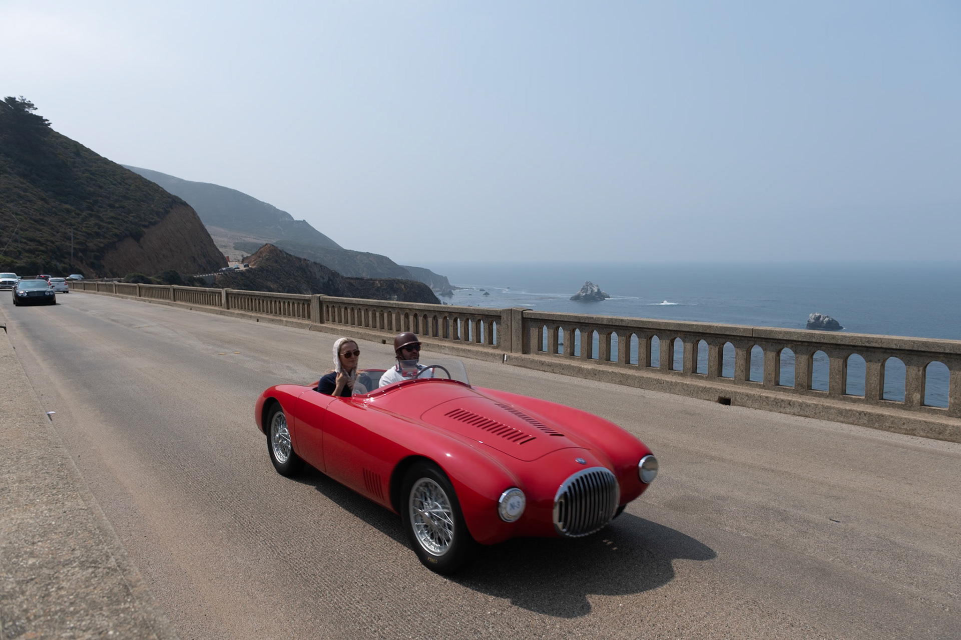 This OSCA MT4 (chassis 1121) is the first prototype MT4 Spider with outside headlights designed by Ernesto Maserati. It was also the first MT4 with the headlights in the fenders. During the early 1950s, OSCAs won hundreds of races in Europe, and they also began to appear at circuits in the United States. This car was ordered through the New York race car dealership owned by the Italian-born race car guru, Alfred Momo. Its first owner was Bill Spear, who drove the car at Elkhart Lake and Watkins Glen, winning both his races. It was then sold to Bill David on the West Coast, where over the next three years it raced three times in the Pebble Beach Cup: with David at the wheel, it finished second in 1953, and then in the hands of Chick Leson, it finished first in 1954 and second in 1955. This important OSCA went on to compete in 25 more SCCA races, gaining 7 wins and 6 second places. After this MT4 officially retired from racing, it passed through the hands of a few additional owners before it was found in British Columbia by its current owner, who returned the car to as-new condition.