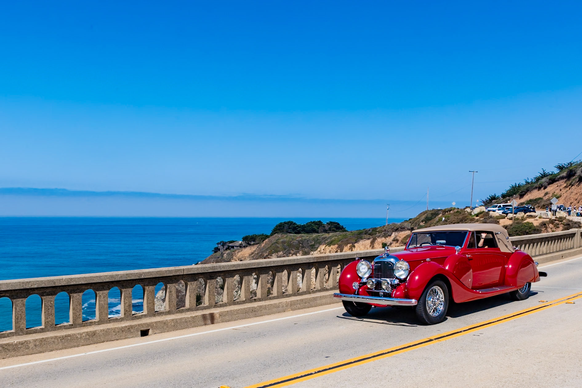 This Frank Feeley–designed Drophead Coupé, one of the most graceful designs seen on a Lagonda, was built right at the Lagonda factory. Only 185 V12 Lagondas were built before the war intervened and this car is listed in factory records as one of the last seven to be completed. The car was shipped to its first owner, Joseph Luchs in New York, a month after war broke out. The car was fitted with a number of special accessories, including a central headlamp and rear fender skirts. To balance the spare wheel on one side, a set of tools and spare spark plugs were ingeniously concealed in a faux spare wheel casing on the other side. Nicknamed “Lipstick,” this Lagonda has lived its entire life in the United States, including time at Harrah’s Automobile Collection and the Blackhawk Museum. It was recently purchased by its current owner, and it is making its first appearance at Pebble Beach after a recent restoration.