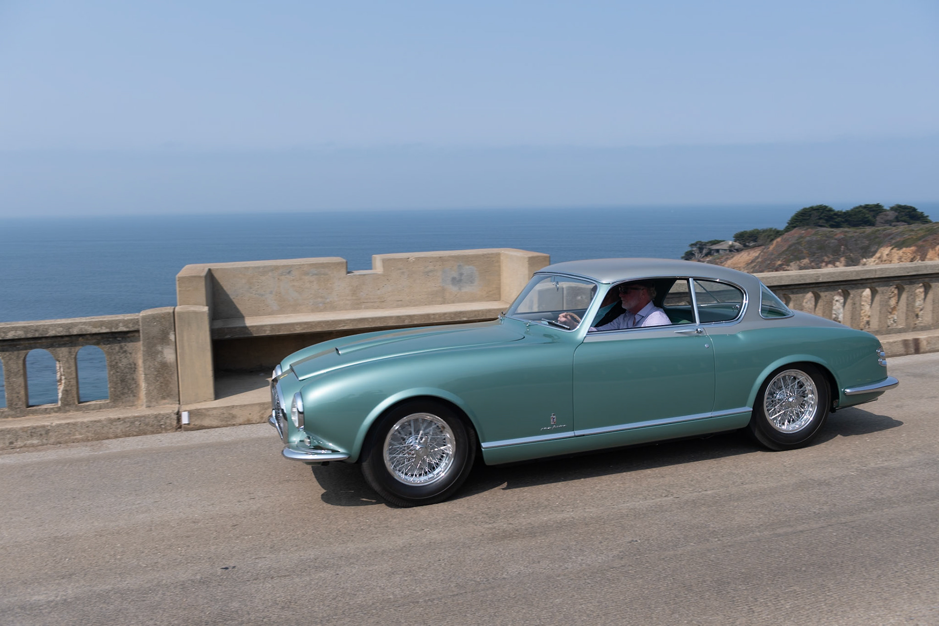 The Ferrari 342 America was one of Ferrari’s most exclusive production series; each car was finished to a customer’s specific order. Just six examples were built in total, three coupes and two cabriolets by Pinin Farina, and one cabriolet by Vignale. The first two 342 Americas were ordered by King Leopold of Belgium and another was owned by Enzo Ferrari himself. This car (chassis 0246AL), the last coupe built, was shown at the 1953 Geneva Motor Show before being delivered to its first owner, Ernesto Fassio, a wealthy shipping magnate from Genoa. According to the factory it was fitted with a larger fuel tank, a rally timer, which is still in the car, and an uprated 230-bhp engine to compete in the 1953 Rallye du Soleil in Cannes as well as later rallies in Italy and France. The car left Europe in 1954 and was shown at its first concours at Wilmot Hills, Wisconsin, by Steve Briggs of Lake Forest, Illinois. After several other owners, the car was purchased in 2013 by its current owner, who restored it.