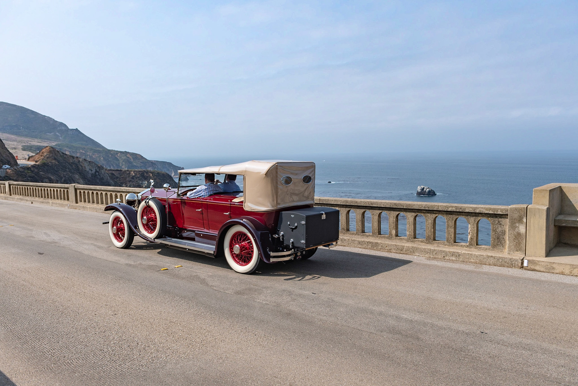 Known as “The Duchess,” this Phantom I Dual Cowl Torpedo Phaeton (chassis 43AL) was built in England and fitted with coachwork by Barker of London. The car boasts several upgrades, including cowl-mounted Zeiss spotlights and a trunk rack complete with a rare Brooks travel trunk. With the tall Auster windscreen to shield its rear passengers, the car was designed for continental touring for its first owner, Sir John Harmsworth, who owned the London Daily Mail newspaper and founded the Perrier Sparkling Water Co. His car was ordered as an exact replica of the Phantom I owned by Sir John’s brother, Lord Rothermere, that later appeared in the film Supergirl starring Faye Dunaway. Sir John owned the car for four years until his death in 1933, and then it passed through five different owners before being purchased by the current owner’s father in 1963. After restoring The Duchess, Irving Jensen Sr. showed it at the Pebble Beach Concours in 1976, when Irving Jr. was just 8 years old. The car is now in the hands of Irving Jensen III.