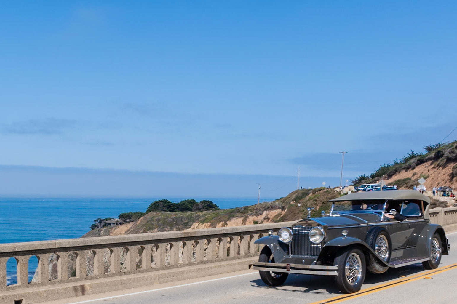 Rolls-Royce first began building automobiles for the American market in 1921 in Springfield, Massachusetts. After the acquisition of the Brewster Body Company in 1926 Rolls-Royce offered a selection of standard Brewster-built coachwork on its New Phantom (later called the Phantom I), which had been introduced that same year as the replacement for the Silver Ghost and offered a larger 7.7-liter engine. This car (chassis S203KR), built for Mr. R. E. Field of Milford, Ohio, had Ascot Sport Phaeton coachwork, a popular choice at the time. In all, some 350 Phantoms were built at the Springfield factory in 1929. This car’s current owner purchased it in 2013 and has restored it to its original configuration, complete with Buffalo Wire Wheels.