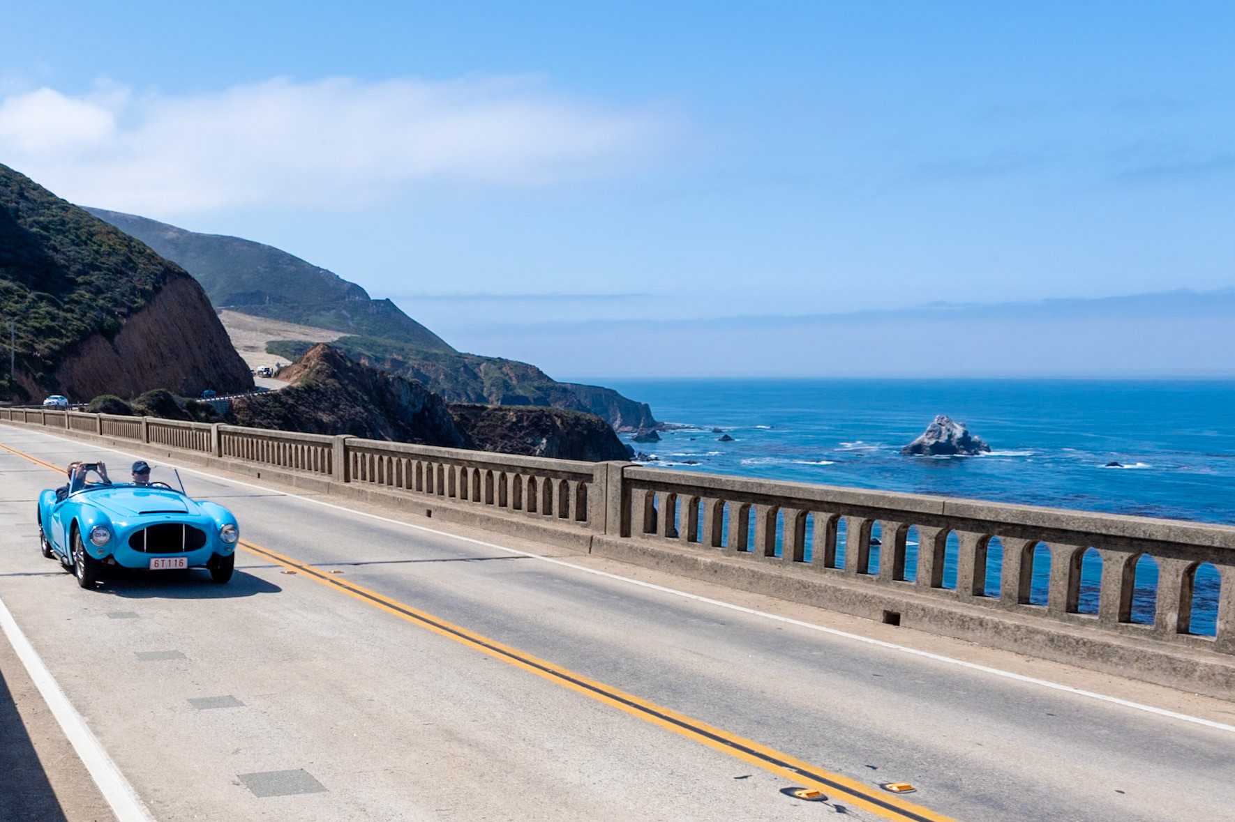 Giovanni Moretti founded his company in 1925 to build and sell racing motorcycles, then in the late 1930s he designed his first car. These were modest sports cars with 600 cc engines; as with many small Italian sports cars, the Morettis were inspired by the Mille Miglia. At the 1950 Turin Auto Salon Moretti presented his own 750 cc twin-cam engine, and it was used in at least two cars in the 1956 Le Mans 24 Hours Race. A 1200 cc version of Moretti’s 4-cylinder engine was later installed in this car, one of two Spyders designed by Giovanni Michelotti. The car was shown on the Moretti stand at the 1955 Brussels Motor Show, where Pierre Haverland of Liège purchased it. He kept it for nearly 20 years, racing it in the Tour de Belgique Rally in 1955 and at a local event held on a frozen lake in the winter of 1962. After he sold the car, it was later abandoned, but it was saved in 2000 by Martin Dijkhof, who oversaw its complete restoration.