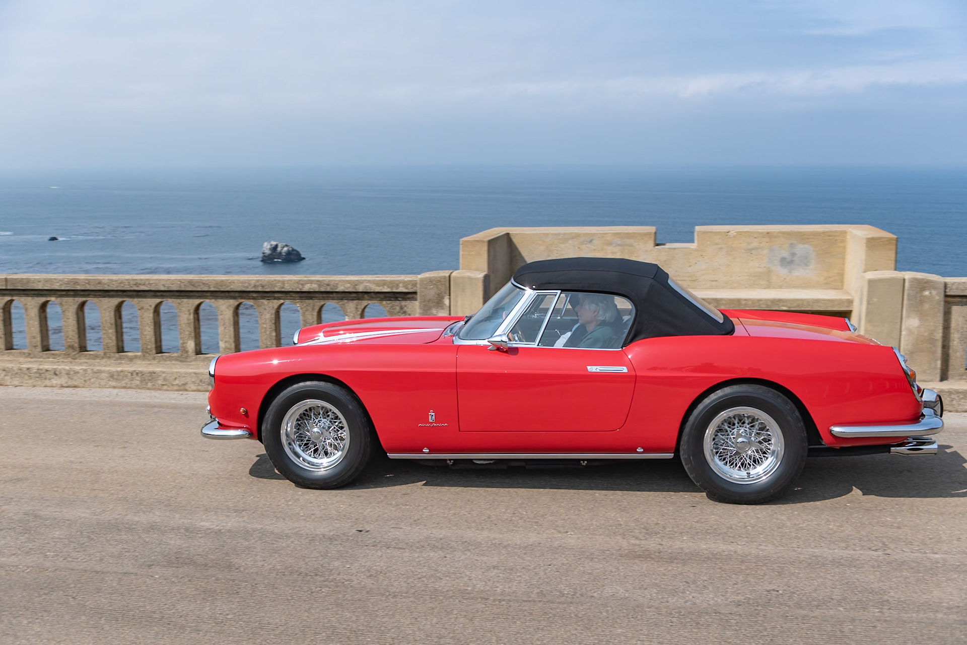 The Ferrari 400 Superamerica was one of the most exclusive road-going cars of its era. It debuted at the 1959 Turin Motor Show and a total of 25 cars were built between 1959 and 1962. It was Ferrari’s first road car where the model designation number referred to the total engine capacity of 4-liters. Several body styles by Pininfarina and Scaglietti were offered, all built on Ferrari’s short 95-inch wheelbase. This Superamerica (chassis 1885SA) is a Series 1 Cabriolet ordered with a factory hardtop and open headlights for its first owner, who lived in Milan. The car also spent a short period in Australia, then was brought to the United States in 1987. It was acquired by its current owner in 2006.