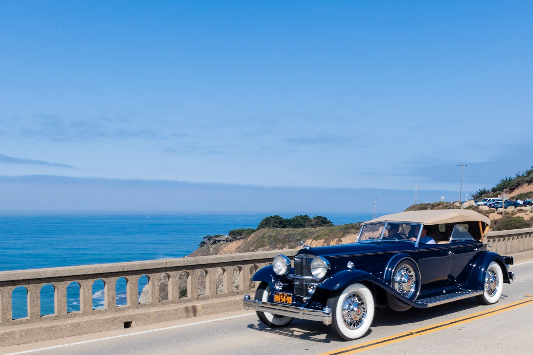 The Vee-windshield Packard 904 Deluxe Eights were essentially the last custom-bodied Dietrichs built in 1931, the last year that Dietrich controlled the company that bore his name. The cars were powered by the 120 bhp L-head straight 8-cylinder engine, the bodies were crafted in the style, colors and trim chosen by the buyer, and they could be fitted with many options, such as the finely built folding wings seen on this car’s rear windscreen. Phaetons were offered only in 1932 and 1933. About a dozen 904 Sport Phaetons were custom built by Dietrich and this car is one of just two that have survived. Past owners of this car have included Otis Chandler, the Imperial Palace Auto Collection, General William Lyon and William E. (Chip) Connor. In 2015 it was acquired and restored by its current owner.