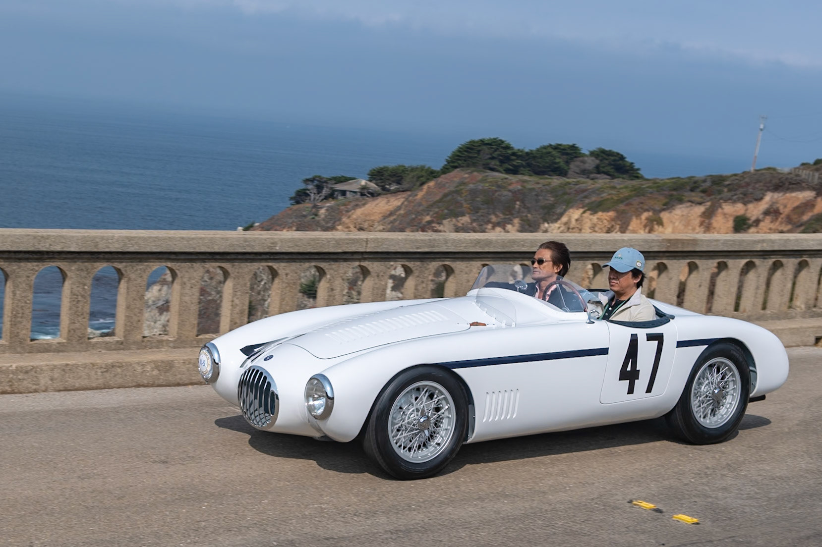 Rees Makins was the first owner of this OSCA MT4 Spider, which was ordered, with the larger 1350 cc engine, via the OSCA importer Edgar Fronteras in Chicago. It first raced at Le Mans in 1953 where it was driven by Phil Hill, then in his first 24 hour race there, and Fred Wacker, then president of the SCCA. Unfortunately, the car eventually retired with gearbox problems. After Le Mans, the car traveled to the United States, where Makins drove it for the 1953 and 1954 seasons, which included the Sebring 12 Hour race. There the car won its class. The car was so successful in 1954 that Makins won that year’s Class G USSRC Championship. The car was bought by its current owner in 2003 and has recently been restored to the American livery it wore at its first race at Le Mans.