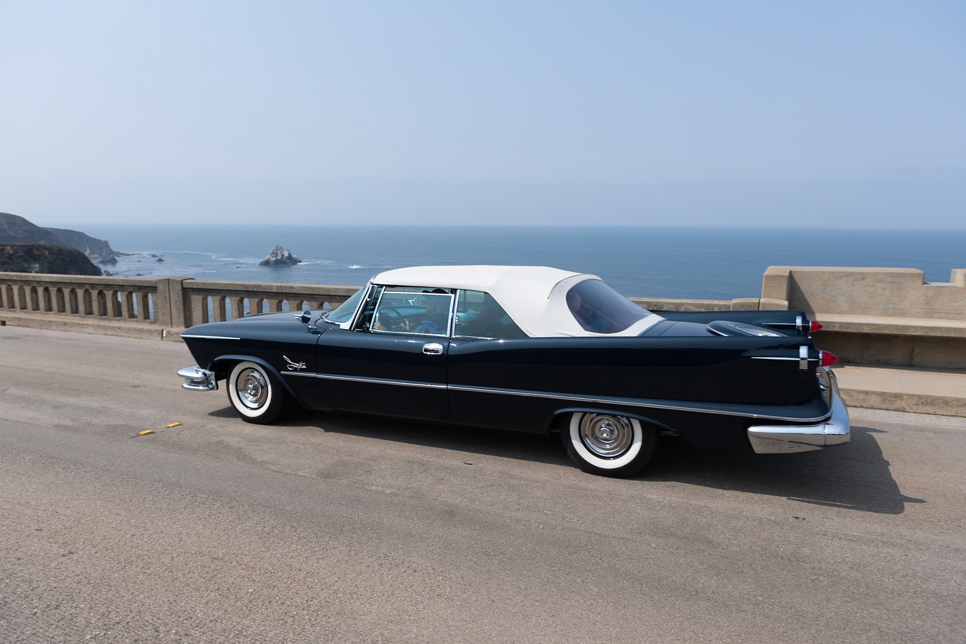 The Chrysler Corporation had used the Imperial model name to define its finer motor car offerings since the late 1920s, but they first chose to use the Imperial name as a stand-alone marque at the beginning of 1955. By 1957 the Imperial lineup was well into its second generation of body styles by Chryslers chief stylist Virgil Exner. His modern “Forward Look” futuristic style featured huge tailfins with gun-sight taillights, and a large rear “deck” that was almost nautical in its appearance. This 1957 Imperial Crown Convertible is one of just 1,167 produced. It was powered by Imperial’s 392 cubic inch Hemi V8, which produced 325 hp to move this 4,830-pound, 18-foot-long monster proudly out of the showroom after the buyer had paid the $5,598 price tag. This is truly an exceptional example from the era of “bigger is better.”