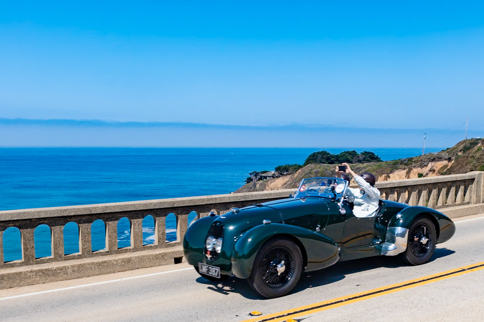 In 1936, Aston Martin developed a new 2-liter engine designed by the brilliant engineer Claude Hill. A new chassis was also designed to fit it, and this became the legendary Speed Model. In its first race, at the 1938 Tourist Trophy at Donnington, the Aston Martin won its class and was second overall with St. John Horsfall at the wheel. The last eight Speed Models to be assembled in 1939 and 1940 were fitted with this unusual aerodynamic steel-framed aluminum body. This Type C competition specification Speed Model is thought to be the final Aston Martin built before World War II; it was delivered just before Christmas 1940 to its first owner, Mr. Ansell of Romsey, England, who used the car in the first postwar Brighton Speed Trials in 1946. Its next owner, a Miss Bean, drove the car in the AMOC Rally in 1949, coming in first in class. After several British owners, the car was restored in 2002 by classic Aston experts Ecurie Bertelli.
