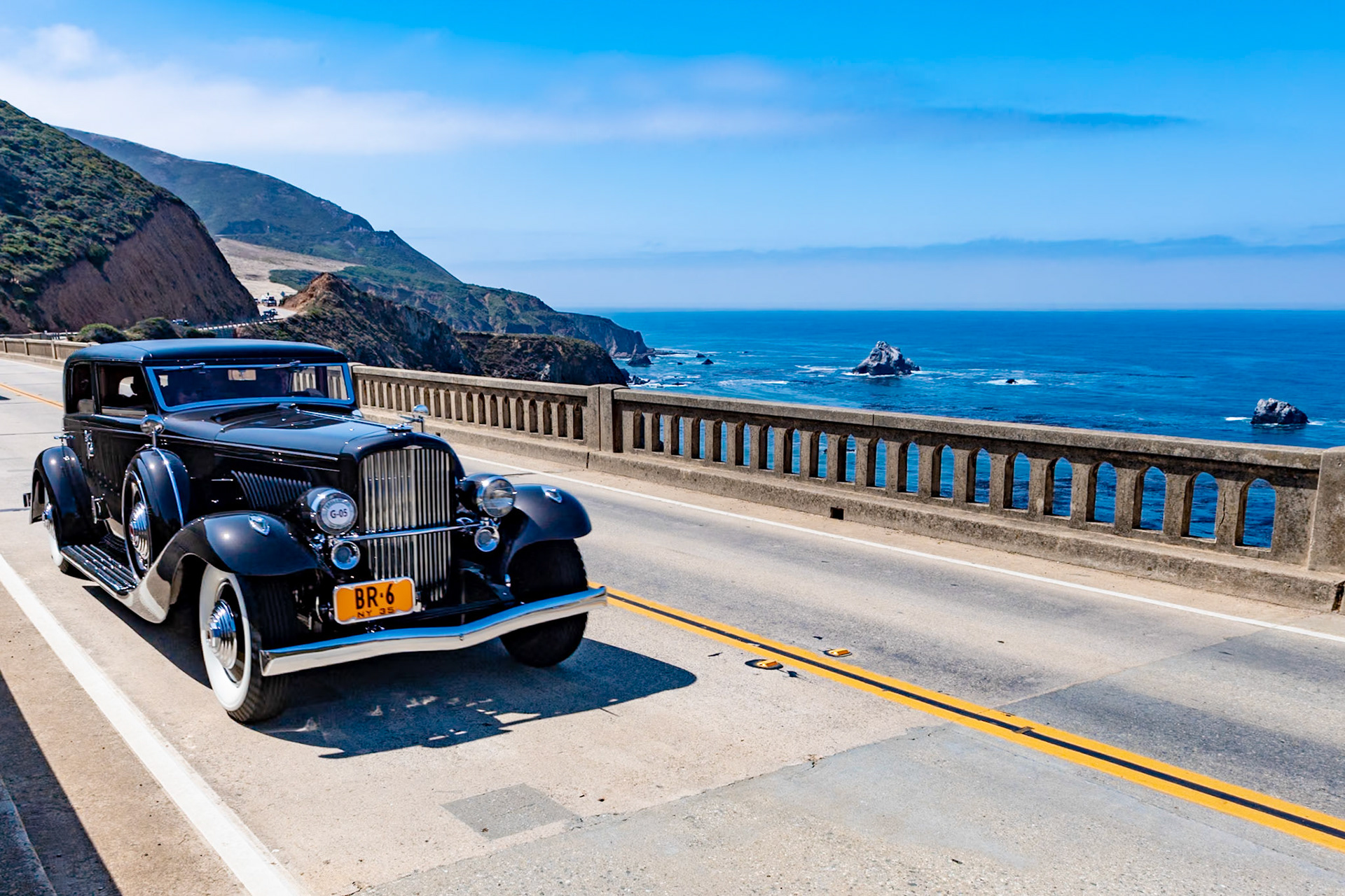In 1933 Duesenberg introduced a more modern and refined version of the great Model J, and this was later called the JN although the company never used that designation. The new chassis was designed to take smaller 17-inch-diameter wheels, skirted fenders, bullet-shaped taillights, and bodies mounted lower on the chassis rails. The first such chassis was bought by actor Clark Gable. This Model JN Rollston Berline was originally sold to Bill “Bojangles” Robinson, the famous Hollywood tap dancer who appeared alongside Will Rogers and Shirley Temple in several films. Robinson later sent the car to Bohman &amp; Schwartz for a few updates, and in the 1950s, after passing through several other owners, the original engine (J559) was replaced and the car received larger Model J wheels. The car was restored to its original configuration in 1970 and has since been carefully maintained. The present owner returned the original engine to the car.