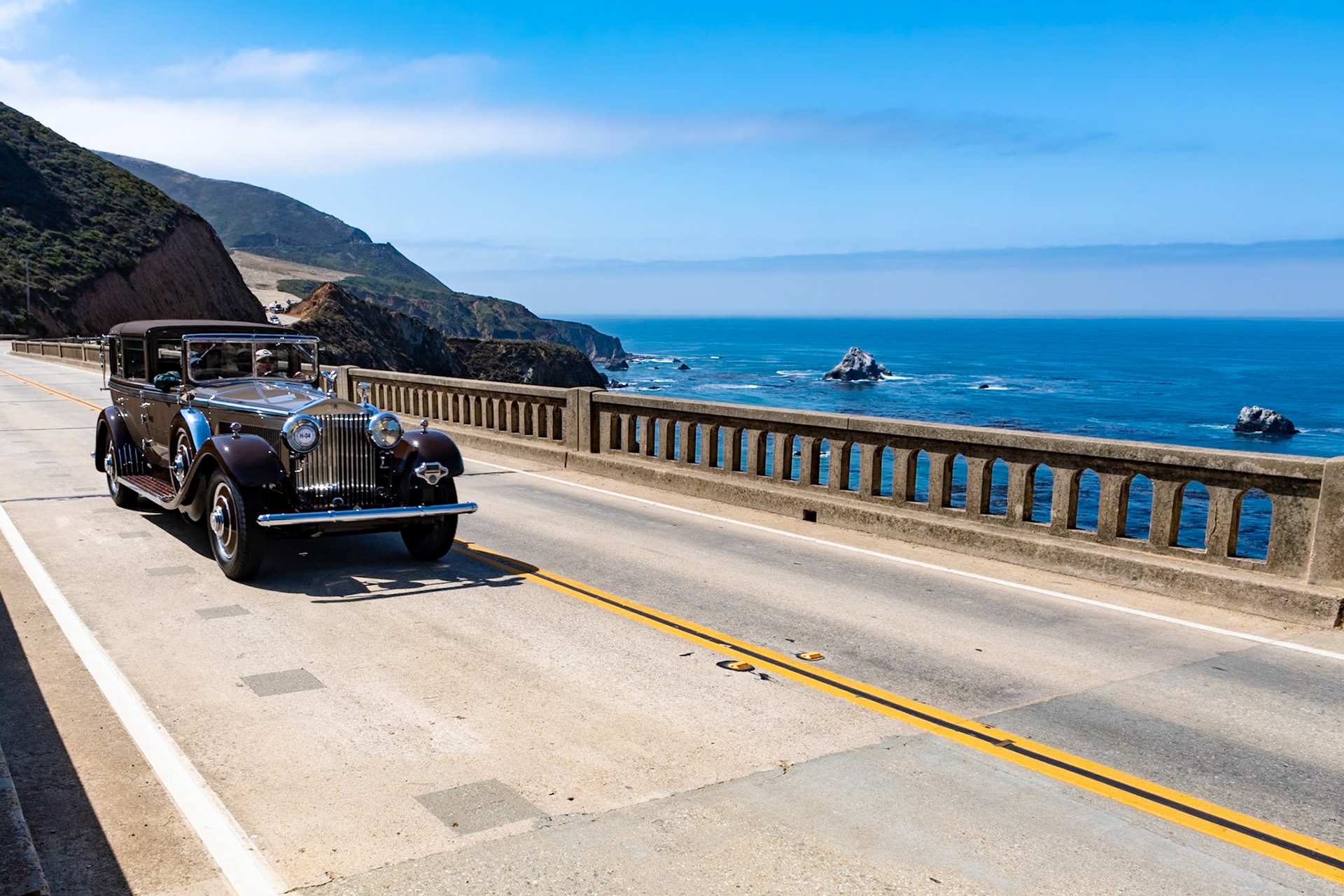 This 1933 Rolls-Royce Phantom II (chassis 282 AJS) was ordered by Mrs. W. H. Luden of the Luden’s cough drop company. She already owned an Isotta Fraschini Tipo 8A with a Castagna Landaulet body, and she commissioned the Brewster Body Company to transfer that body to her new Rolls chassis. The result was this elegant Phantom II, combining Italian style with British engineering and American accents like the Brewster-style running boards. The interior features an ingenious illuminated system for notifying the chauffeur, using any of several languages, to turn left, turn right, speed up, slow down, turn around or go home. When purchased by the Atwell family in 1984, this unique Rolls-Royce had been completely dismantled. It was restored over the course of five years.