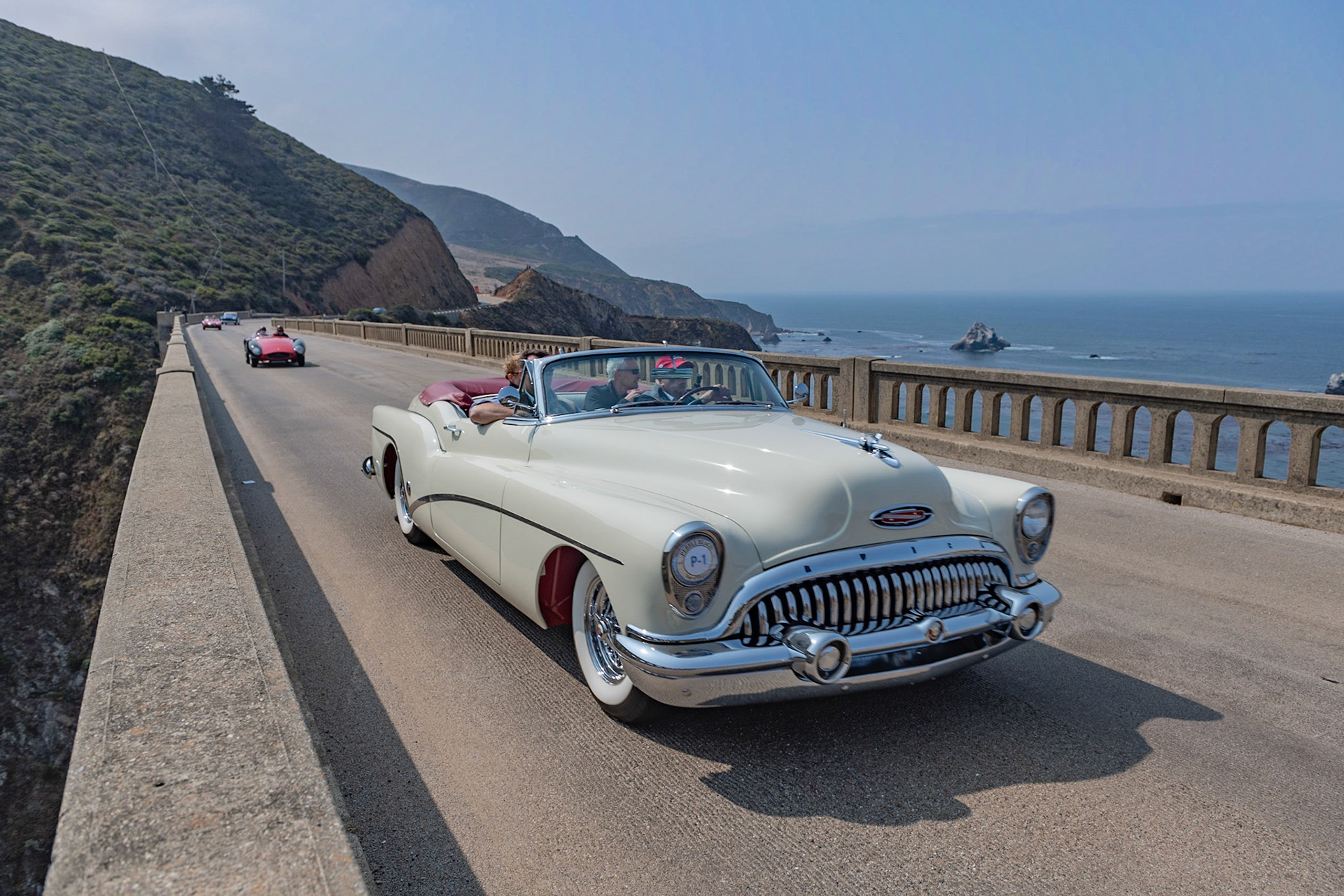 For 1953 General Motors offered a trio of special, low-production convertibles in their top three auto lines, Cadillac, Buick and Oldsmobile. This car is one of the 1,690 Buick Skylark Convertibles built as part of that trio and powered by Buick’s new 331 cubic inch, 188-hp V8 engine. The Skylarks began life as standard Roadmaster convertibles but were pulled off the production line to be hand finished. The windshield was cut four inches lower, the belt line was dipped just behind the doors, and stainless steel was used for the classic Buick sweep spear that arched over the wheel cutouts. Dayton chrome spoke wheels filled the wheel wells, which were painted in a contrasting color. Even the classic Buick portholes on the hood were deleted to signify this Buick was a custom job. The car’s price was $5,000, $1,500 above the standard Buick Roadmaster Convertible. Interestingly, the Riviera was the only one of the GM trio that did not use the all-new GM wraparound windshield.
