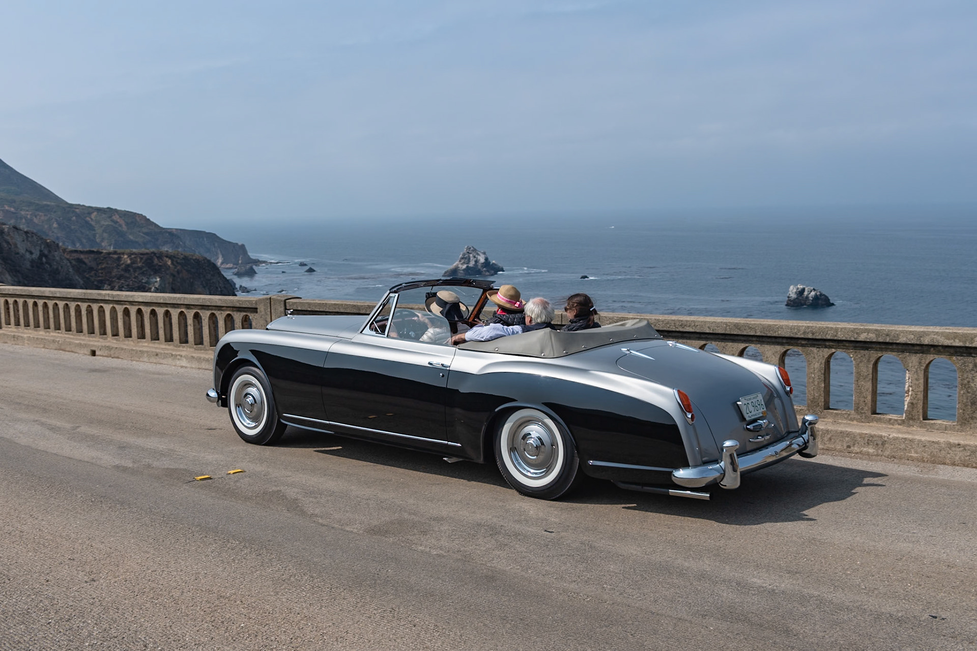 The Bentley S1 Continental was conceived to be an exclusively coachbuilt car. Accordingly, each of 432 S1 Continentals received coachwork from the few remaining coachbuilders that survived World War II. H. J. Mulliner, Hooper and James Young all built a variety of both open and closed bodies, but this drophead coupé is one of just 31 built by Park Ward. Bentley records show that this car (chassis BC91LBG) was delivered at the end of 1956 to Frederick Brewster of Connecticut. He was connected to the famous coachbuilding firm of Brewster &amp; Co., and the family can trace its roots back to Elder William Brewster, who sailed on the Mayflower in 1620. Frederick’s daughters, Susan and Priscilla, inherited the car in 2012 and commissioned a full and complete restoration from Vantage Motorworks to its original specifications in Shell Grey over Black with Black top and Light Grey hides.