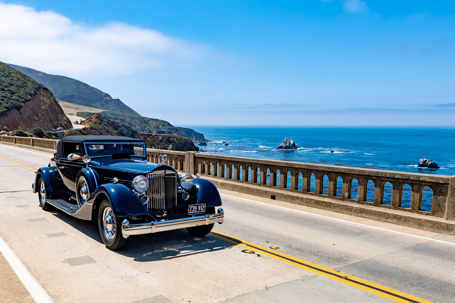 The Eleventh Series Packard Twelve was the last Packard to feature the classic swept fender lines. It also has the classic Vee-shaped radiator and matching headlights and fender lights. The interior is equally elegant, with walnut trim and many luxurious fittings. The Packard Twelve is powered by a 445-cubic-inch, V12 engine delivering160 bhp. Packard offered a huge array of body styles in 1934 but the Coupe Roadster with rumble seat for two passengers is considered by many collectors to be the most desirable. Just 50 examples were produced in 1934 and about 20 are known to have survived. The current owner of this Coupe Roadster acquired it in 2015, and it has now been restored to its original Packard Blue.