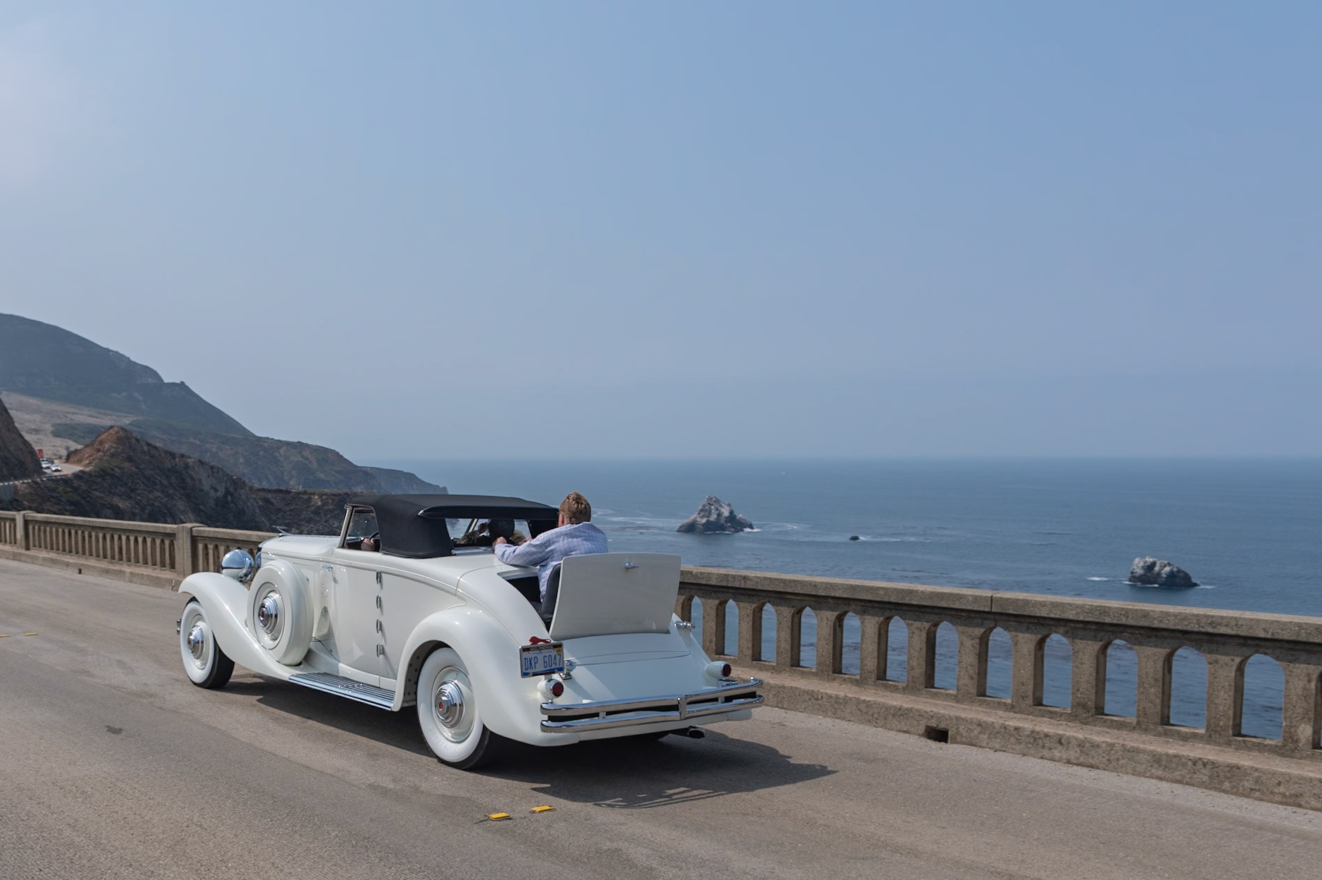 The rarest and perhaps the most desirable Duesenberg model is the SJN, which combines a supercharged SJ engine with the lower and wider bodywork from the JN, first seen in 1933. Only five Model JN convertibles were built by Rollston, and this car (J-564) is the only one with a factory-equipped supercharger. All of the Rollston convertibles were designed by Herb Newport, and the first one was bought by Hollywood legend Clark Gable. Aluminum alloy was used extensively in the engine as well as many other mechanical components, which kept the weight of this massive car down to just under 5,200 pounds and allowed even an un-supercharged Model JN to achieve a staggering 89 mph in second gear and over 120 in top. This car was owned for nearly 60 years by the same family before being acquired by its current owner in 2000. Since then it has been sympathetically refurbished, keeping almost all of its original features intact.