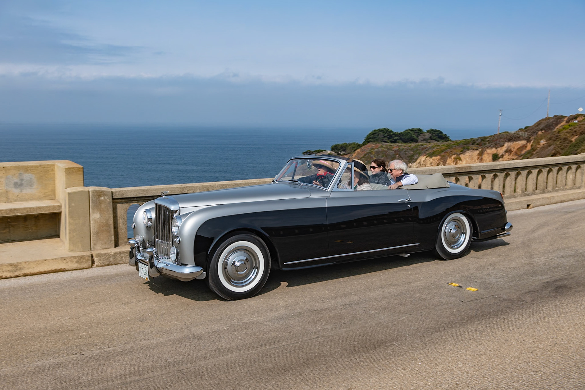 The Bentley S1 Continental was conceived to be an exclusively coachbuilt car. Accordingly, each of 432 S1 Continentals received coachwork from the few remaining coachbuilders that survived World War II. H. J. Mulliner, Hooper and James Young all built a variety of both open and closed bodies, but this drophead coupé is one of just 31 built by Park Ward. Bentley records show that this car (chassis BC91LBG) was delivered at the end of 1956 to Frederick Brewster of Connecticut. He was connected to the famous coachbuilding firm of Brewster &amp; Co., and the family can trace its roots back to Elder William Brewster, who sailed on the Mayflower in 1620. Frederick’s daughters, Susan and Priscilla, inherited the car in 2012 and commissioned a full and complete restoration from Vantage Motorworks to its original specifications in Shell Grey over Black with Black top and Light Grey hides.