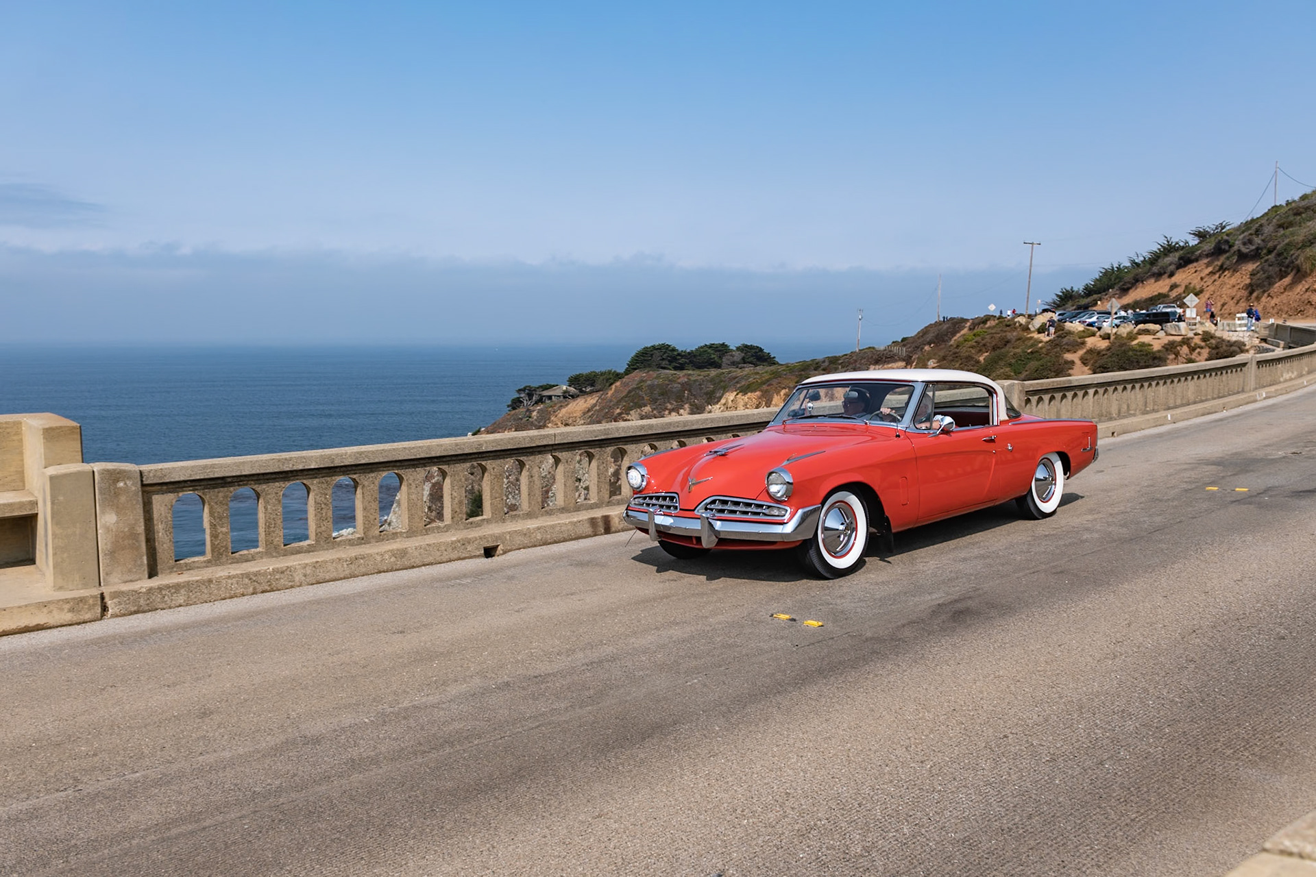 The Studebaker Commander Starlight Coupe, designed by Raymond Loewy in 1954, was the first all-new Studebaker since 1947. Although it had a relatively old-fashioned V8 engine beneath its hood, the low-slung European design was far ahead of its time. This car was first purchased by William Babich of East Pittsburgh and remained with him for 60 years. He cared for this car so much that only his wife and a niece were allowed in the car—and they could not wear any clothing with buttons or zippers for fear of scratching the paint! From 1954 to 1959 Babich put just 6,683 miles on the car, using it only during the summer months. In 1960 he stopped using the car altogether, but would start it once a month and then drive it once a year to have it inspected. From 1963 to the present the car has only covered 80 miles. After William passed away, the Babich family made sure that the car went to someone who would treasure it as much as William had done—and in 2014, Wayne Carini became the car’s second owner.