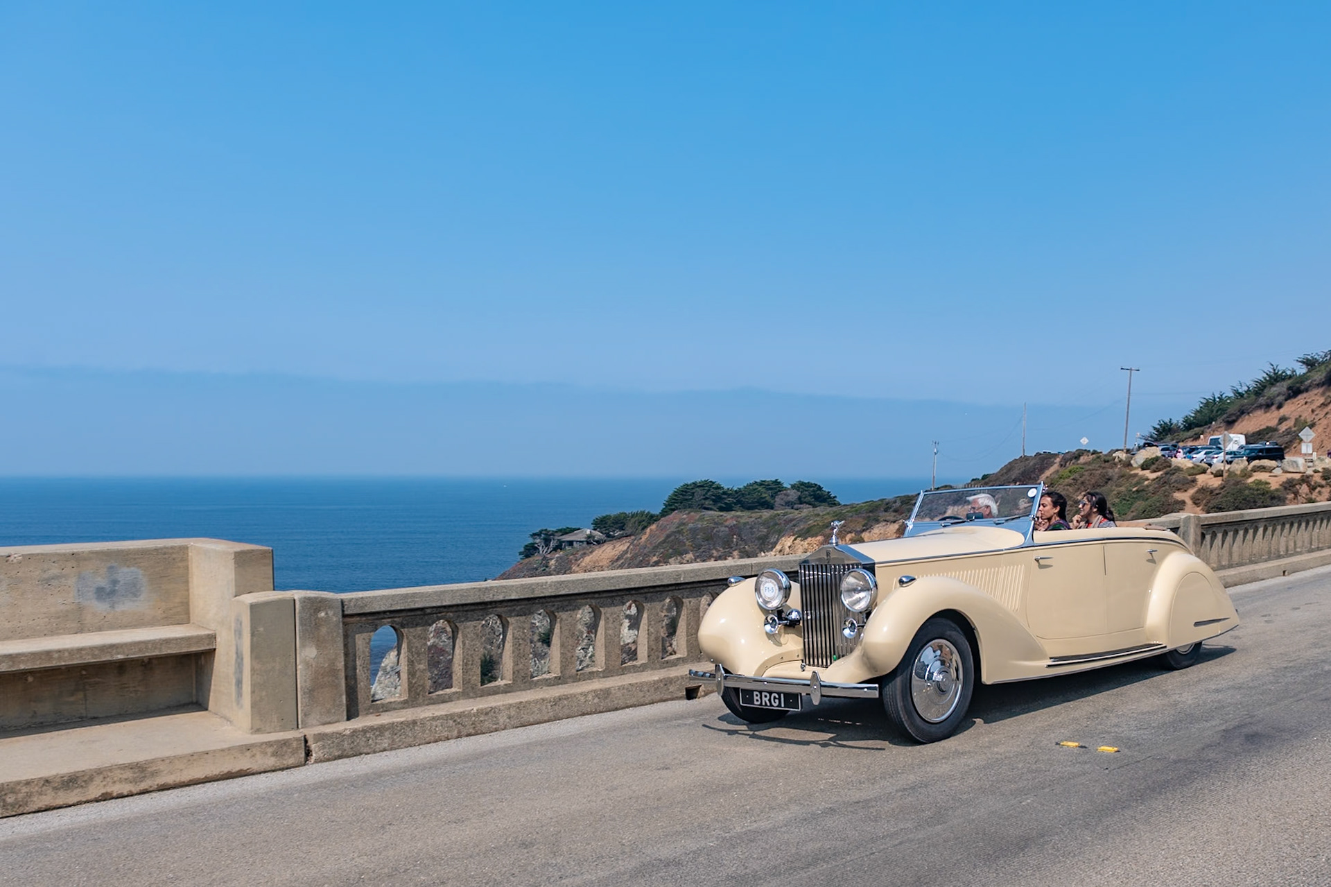 This Rolls-Royce 25/30 HP All Weather Tourer (chassis GRO48) was bodied by Gurney Nutting and supplied to the Maharajah of Darbhanga. The 25/30 HP was an entry-level Rolls-Royce with an enlarged 6-cylinder engine developed from the Rolls-Royce 20/25 HP—the same engine used in the more sporty Bentley 4¼ Litre. The car was also equipped with servo-assisted brakes built under license from Hispano-Suiza. This Rolls-Royce 25/30 HP with its 4-door, all weather, disappearing-top body, is one of three identical cars shipped to India before the war—and all three survive today. This actual car was the model used by Rolls-Royce in its Indian newspaper advertisements. It was bought by its current owner in 1973 and restored in England 20 years later. This the first time the car has been seen at Pebble Beach.