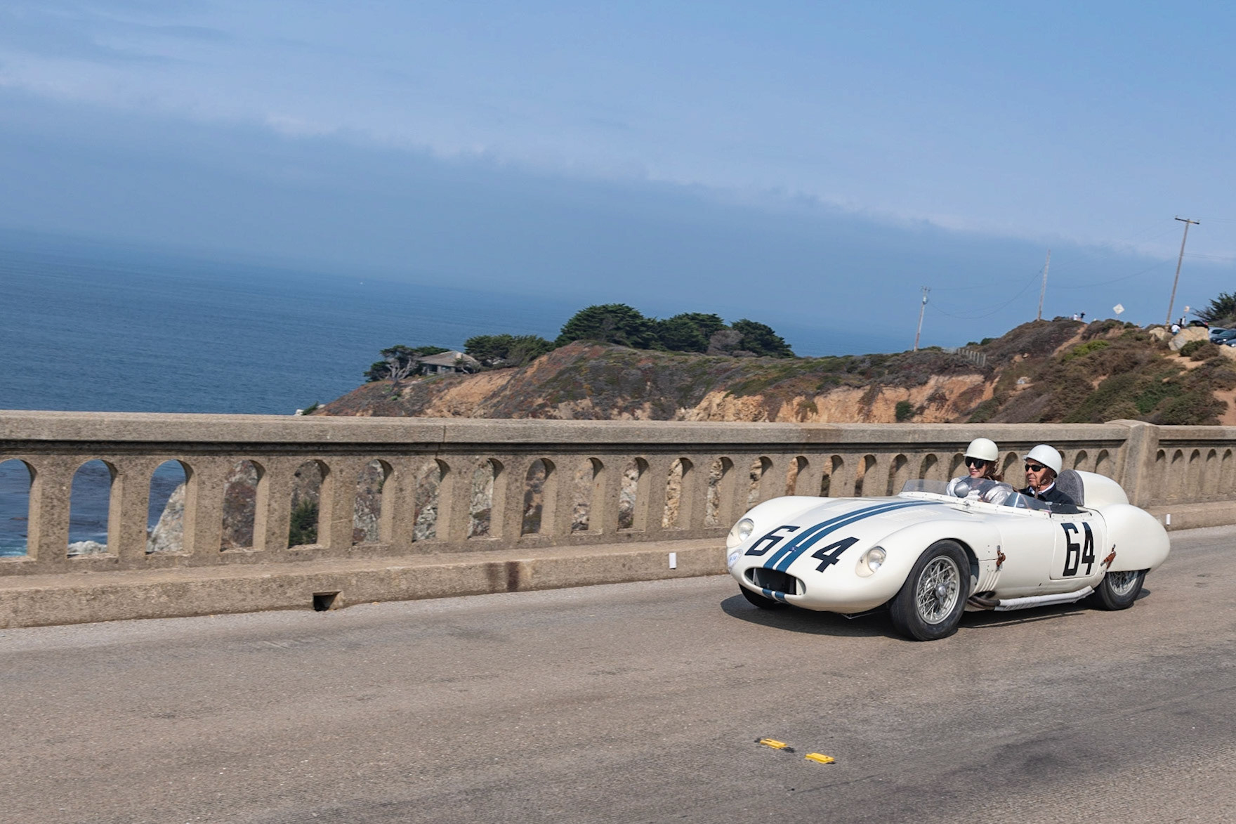 The OSCA S273 was originally designed for the 1100 cc OSCA engine, although this car (chassis 767) was fitted by the factory with the tiny 750 cc 4-cylinder, 75 bhp motor. It was ordered by Briggs Cunningham and was delivered in the summer of 1959 to Cunningham’s race manager, Alfred Momo in New York City, who prepared it for the Cunningham team. Cunningham owned several OSCAs in period, and the S273 was entered at six events during 1959. The car’s most significant race was at the 1960 12 Hours of Sebring, where it was co-driven by Denise McCluggage and Marianne Windridge. After that the car was not used again by the Cunningham team and was sold to privateer Cecil Schoeneman who drove it in several races in the Midwest. At this point, the original 750 cc engine was at the end of its life, and a larger 860 cc Tipo 187 engine was fitted. Then the car was sold to Dr. John Hunholz of Washington. He restored the OSCA, keeping it for the next four decades, until its current owner acquired the car in August 2015. It has now been restored again and wears its original Cunningham livery.