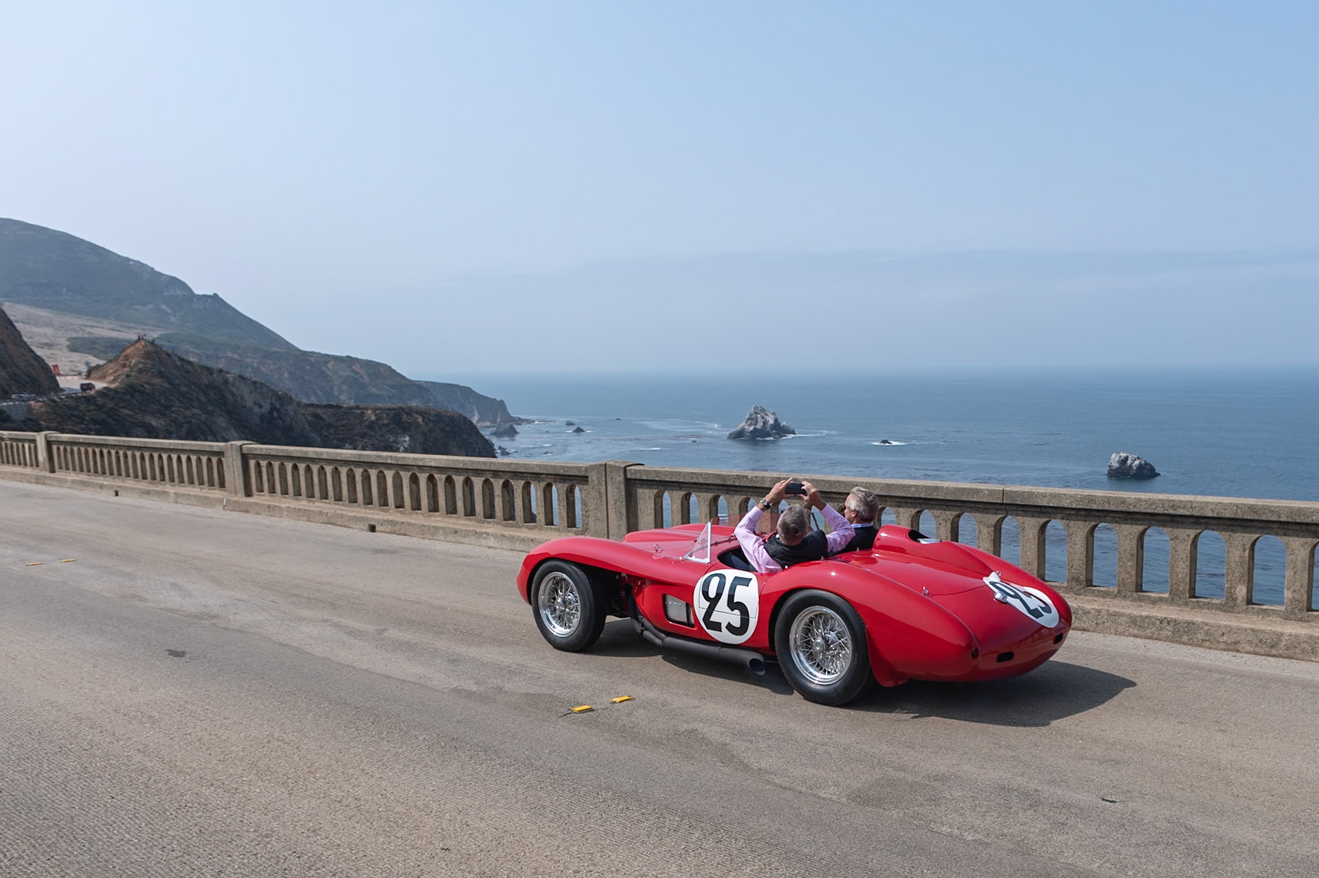 For the 1956 season, Ferrari developed a new 2-liter engine to outpace its main rival, the Maserati 200 S. Designed by Ferrari’s new chief engineer, Vittorio Jano, the new 4-cylinder engine used Aurelio Lampredi’s Mondial 500 as a starting point. The new engine was given bright red cylinder heads, and the name Testa Rossa was born. Scaglietti created the body for the 500 TR, and the new car first raced in the 1956 Monza Supercortemaggiore where Peter Collins and Mike Hawthorn secured victory. This Testa Rossa (chassis 0600MD TR), is that first Testa Rossa, which was delivered to the Ecurie Francorchamps team. It raced throughout Europe in 1956 then was sold back to the factory. After three lesser races with Francois Picard, Ferrari sent the car to Luigi Chinetti to be raced at Nassau in 1958, but it was crashed by Pedro Rodriguez and returned to Scaglietti to be rebodied with pontoon-fenders. Rodriguez raced the rebodied car at Le Mans, then it was sold to Jim Hunt and Lucky Casner, who raced it successfully in the United States in 1959, its last competitive year.