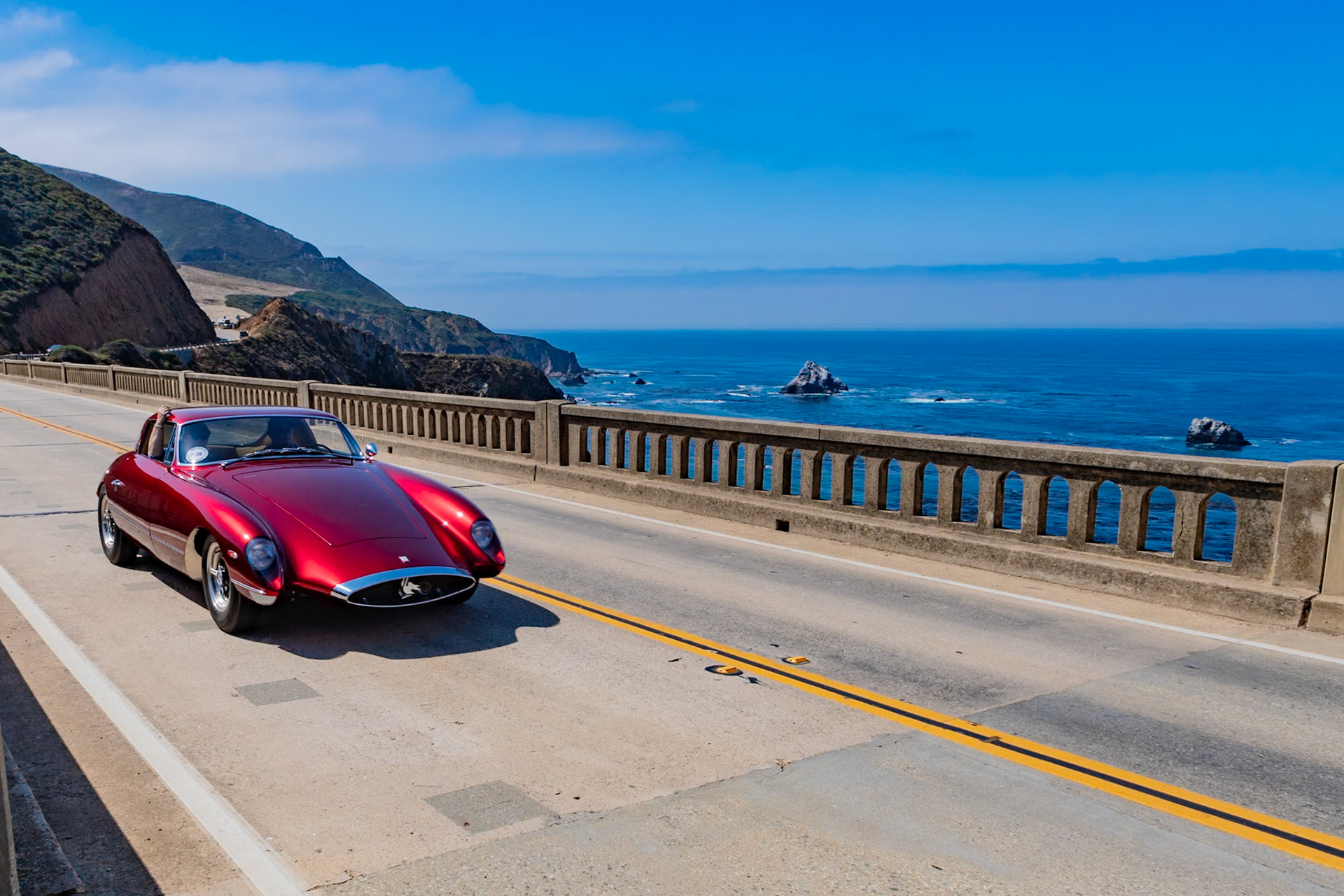 Richard Bosley was heavily involved in motorsport during the 1950s. He built his own sports car, the Bosley Mark I, which was used as a daily driver. Bosley later traded that car for a racing Corvette SR-2 chassis that became the foundation for this Bosley Mark II Interstate, which first turned a wheel in 1966. He named it the “Interstate” for its intended use on the miles of new highways that were springing up all over the United States. The monocoque fiberglass body was built on his Corvette chassis, and the car was fitted with a 345 bhp, Tri-power Pontiac V-8 engine and a Corvette manual transmission. The car was featured in several magazines and was also invited to The Henry Ford museum for the Annual Sports Cars Review in 1967. Abandoned until the early 1990s, it was acquired by the current owner and shipped to Florida for a complete restoration.