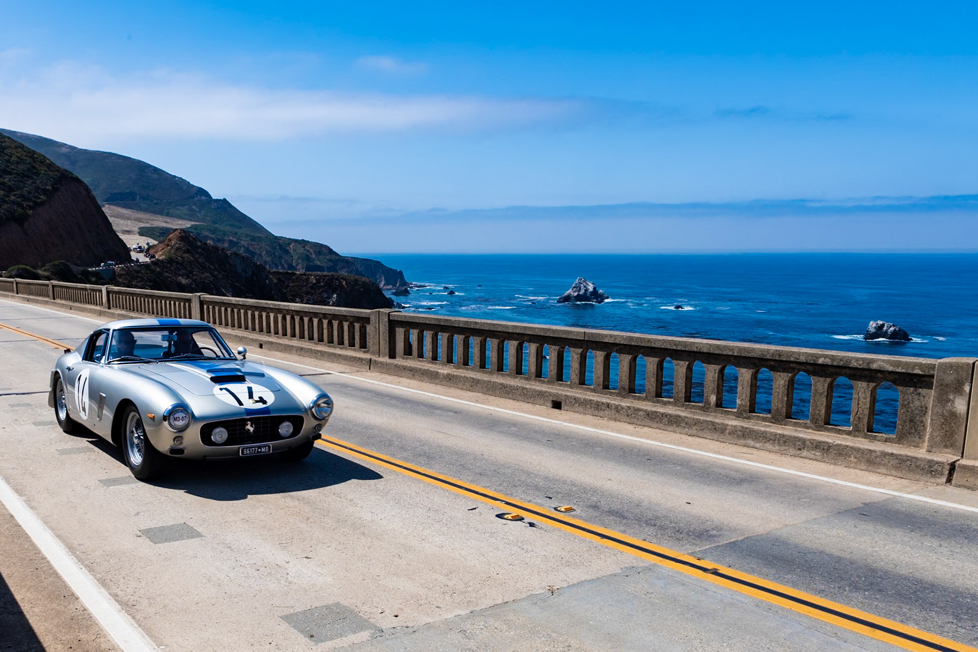 In 1961 Ferrari launched the ultimate 250 GT SWB, often referred to as a SEFAC Hot Rod but also known more formally as the Comp/61. A few of the 250 SWB Competiziones also received a mechanical makeover for the 1961 season. At the time there was little competition that could rival the SWB in the GT class, and it often beat the Jaguar E-type and Aston Martin DB4 in sports car races. This car (2689GT) is one of the most famous of the 20 alloy-bodied SWBs. It was driven to third overall and first in class at the 1961 24 Hours of LeMans by Pierre Noblet and Jean Guichet. They continued to race the car and racked up what is probably the most desirable of race records among all the SWBs.