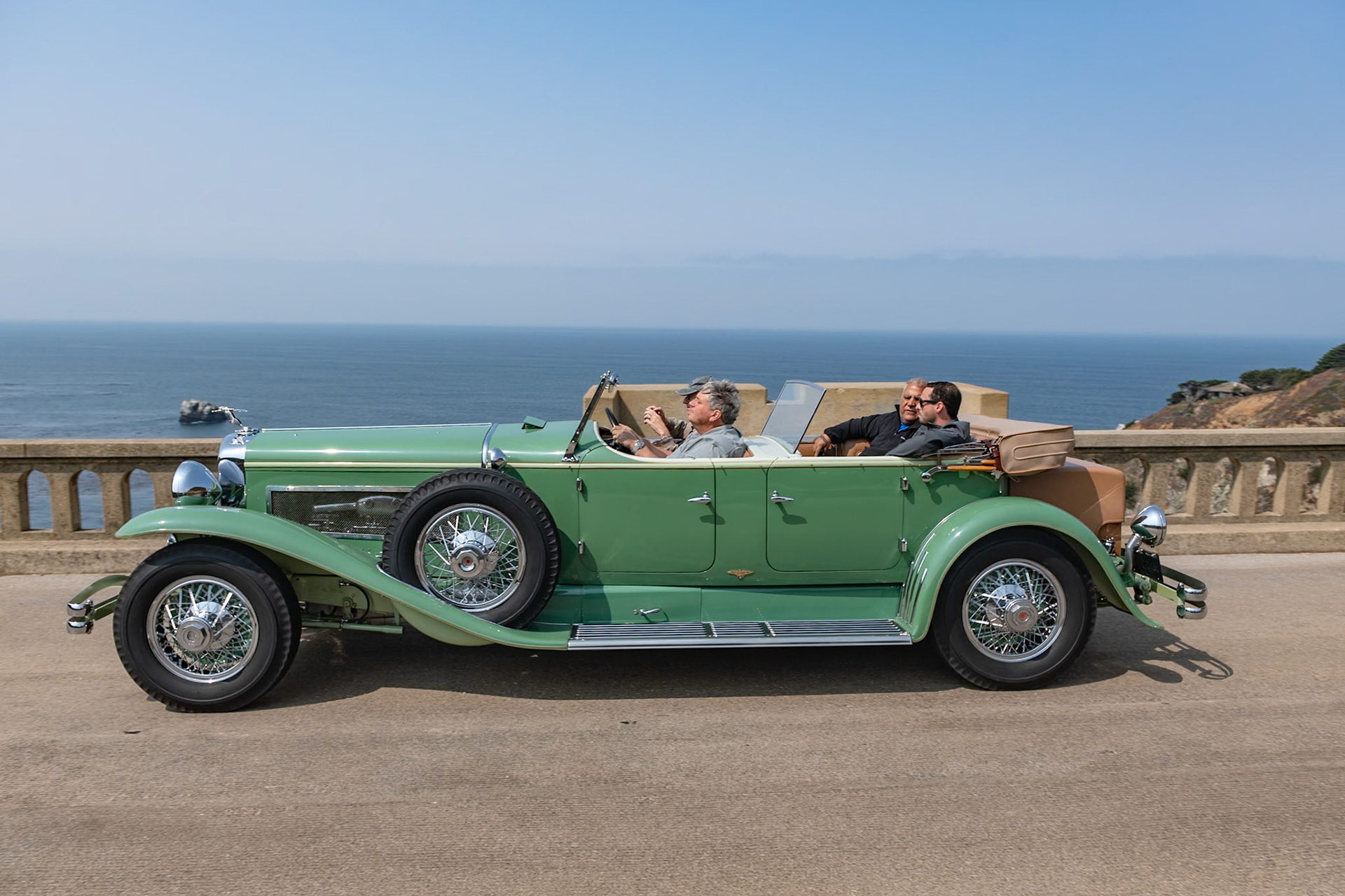 The Duesenberg Model J was available on either a long wheelbase of 153.5 inches for 7-passenger coachwork or a standard chassis of 142.5 inches. This Duesenberg J with Tourster coachwork by Derham is built on the longer chassis. The Tourster style was designed by Gordon Buehrig and, unlike other Dual Cowl Phaetons, it features a second windshield that slides up and down behind the front seat by means of a crank handle. The Tourster was Buehrig’s favorite design and he chose the Derham Body Company of Rosemont, Pennsylvania, to be the exclusive builder of this coachwork. This Duesenberg (J451) is one of eight original Tourster models. It was sold new to David G. Joyce of Chicago. Today it is one of very few remaining original examples of what many consider to be Derham’s most beautiful coachwork.