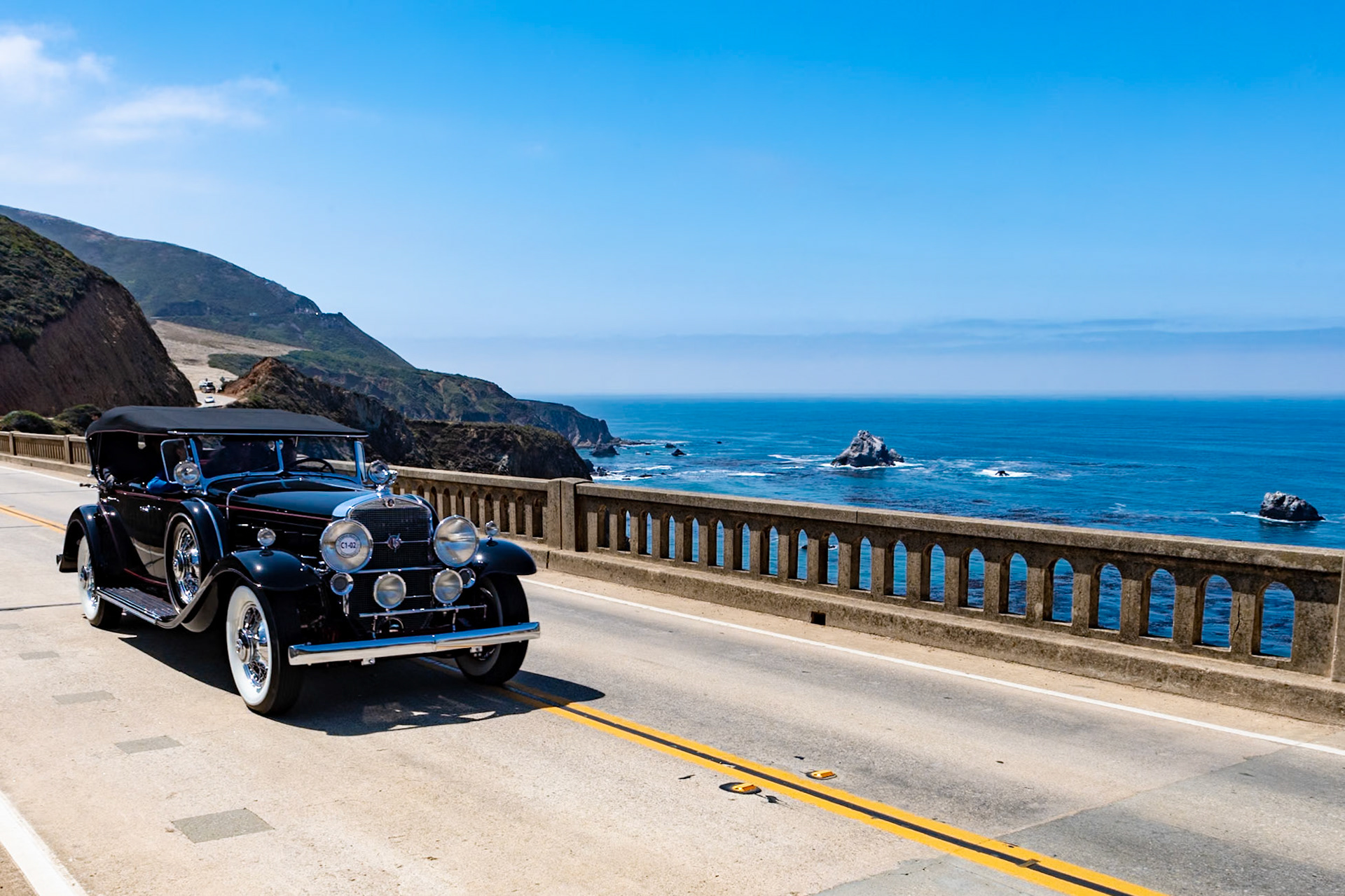 Cadillac introduced its new and luxurious V-16 automobile at the 1930 New York Salon in response to the Duesenberg Model J that had amazed the world when introduced in late 1928. The V-16 had an equally impressive performance, displacing 452 cubic inches and producing 185 bhp. Only 85 Fleetwood sport phaetons were produced on the V-16 chassis and today these cars are extremely rare. This example is fitted with attractive dual cowl coachwork; the cowl for the rear-seat passengers is mounted directly to the rear of the front seat and is raised and lowered by turning a small crank. This gives the car its distinctive low line. The body is sometimes referred to as a four passenger roadster.