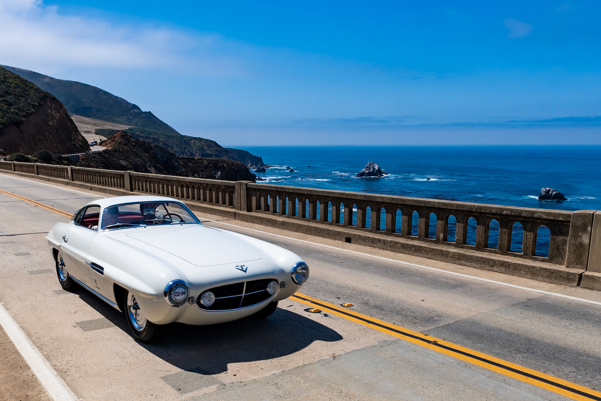 The Fiat 8V (the Otto Vu) made its public debut at the Geneva Auto Salon in March of 1952. The car was powered by Fiat’s new 70-degree, overhead-valve V8 engine designed by Dante Giacosa. A total of 114 examples of the 8V were built, and 40 of these had Fiat factory coachwork while the rest were finished by other Italian carrozzerie. Ghia built 15 of these 8V Supersonics designed by Giovanni Savonuzzi. This car is thought to have been the one shown at the 1954 New York Auto Show. The original owner of this car was Howard “Dutch” Darrin, who then sold it to Briggs Cunningham. It was one of two Supersonics bought by Darrin; he later sold the other one to actress Lana Turner. This car disappeared for a time, but in 1962 it was spotted in Beverly Hills without its original engine and transmission and painted red. Its current owner has restored the car, reuniting it with its original engine and returning it to its original paint color and trim.