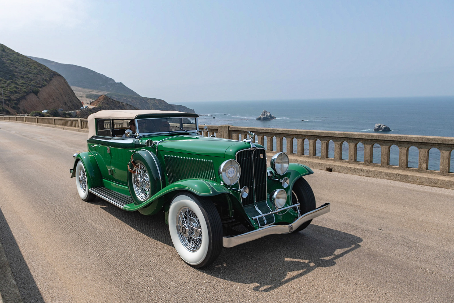 In 1932, E. L. Cord’s Auburn Automobile Company launched a luxurious V12-engined car to compete with offerings from Lincoln, Pierce-Arrow, and Cadillac. Designed by chief engineer George Kublin, the narrow 45-degree V12 produced 160 horsepower from 391 cubic inches. And the car was fitted with Auburn’s famous Dual-Ratio rear axle, which allowed it to be driven either in high-gear ratios for open country roads or in a lower ratio designed for city driving. The coachwork styling from Alan Leamy made these Auburns some of the most beautiful cars of the classic era. Built from 1932 to 1934, the Auburn was listed at a very reasonable $1,795, but due to the economic climate of the time, this price was reduced to an almost cheap $1,295. Recently restored by its current owner, this Auburn 12-160A Phaeton is the earliest surviving example from the seven listed in the Auburn Cord Duesenberg directory.