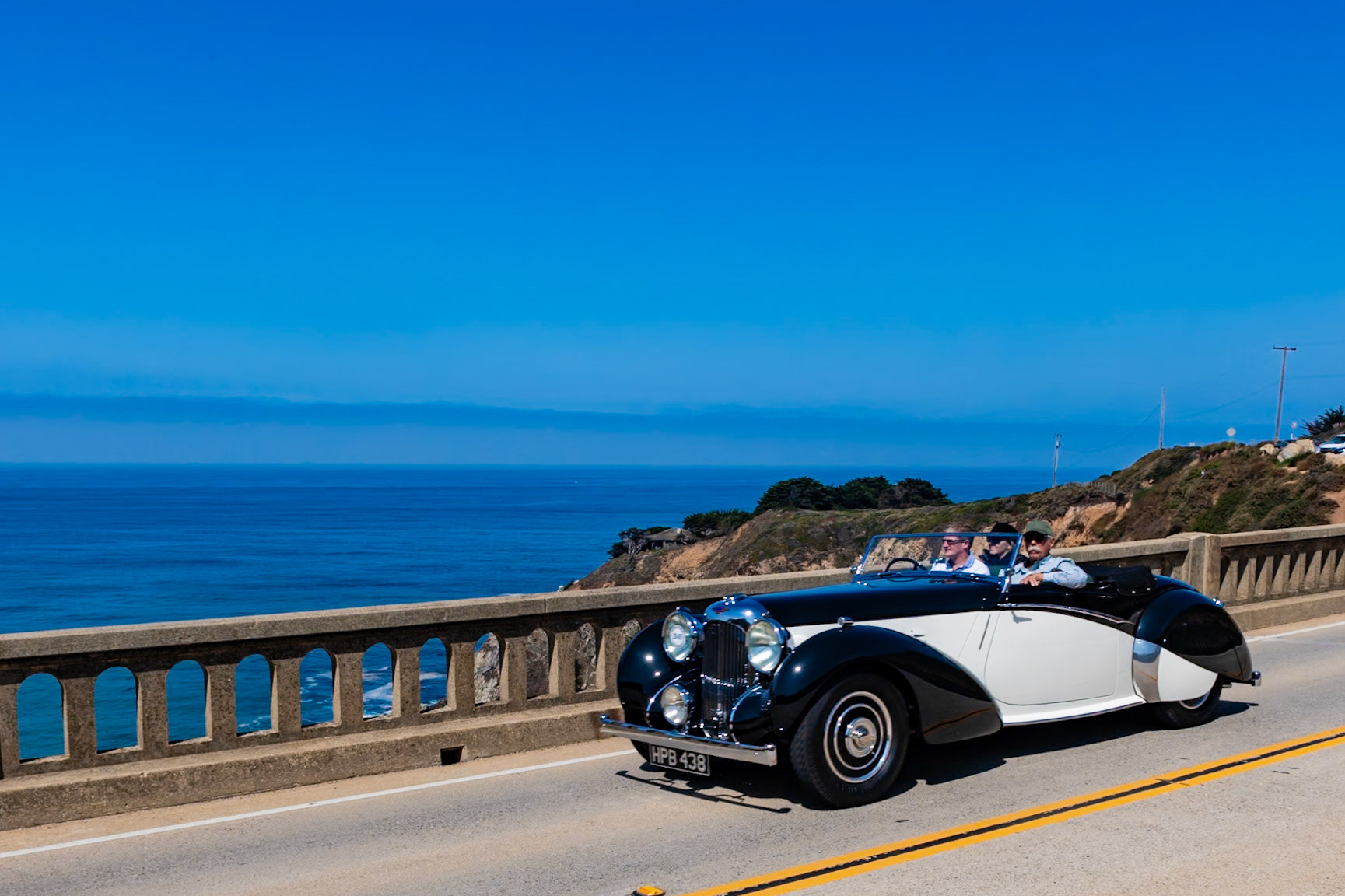 This Lagonda, built in January 1938, is the first of the V12-engined Rapides. The 4.5-liter V12 was designed by W. O. Bentley after he left Rolls-Royce. This car, believed to be one of just 12 Rapides built to this design as a drophead coupé, was sold to the building magnate and car collector Sir Alfred McAlpine, who used it regularly until 1955. During a service visit to the Lagonda works in 1941, it was fitted with the four-carburetor setup used by the Lagonda team cars at Le Mans in 1939. It has since spent decades in both the United States and Europe, and was owned for a time by Lord Anthony Bamford. At one point it received a ground-up four-year restoration, but in recent years it has rarely been shown in public.