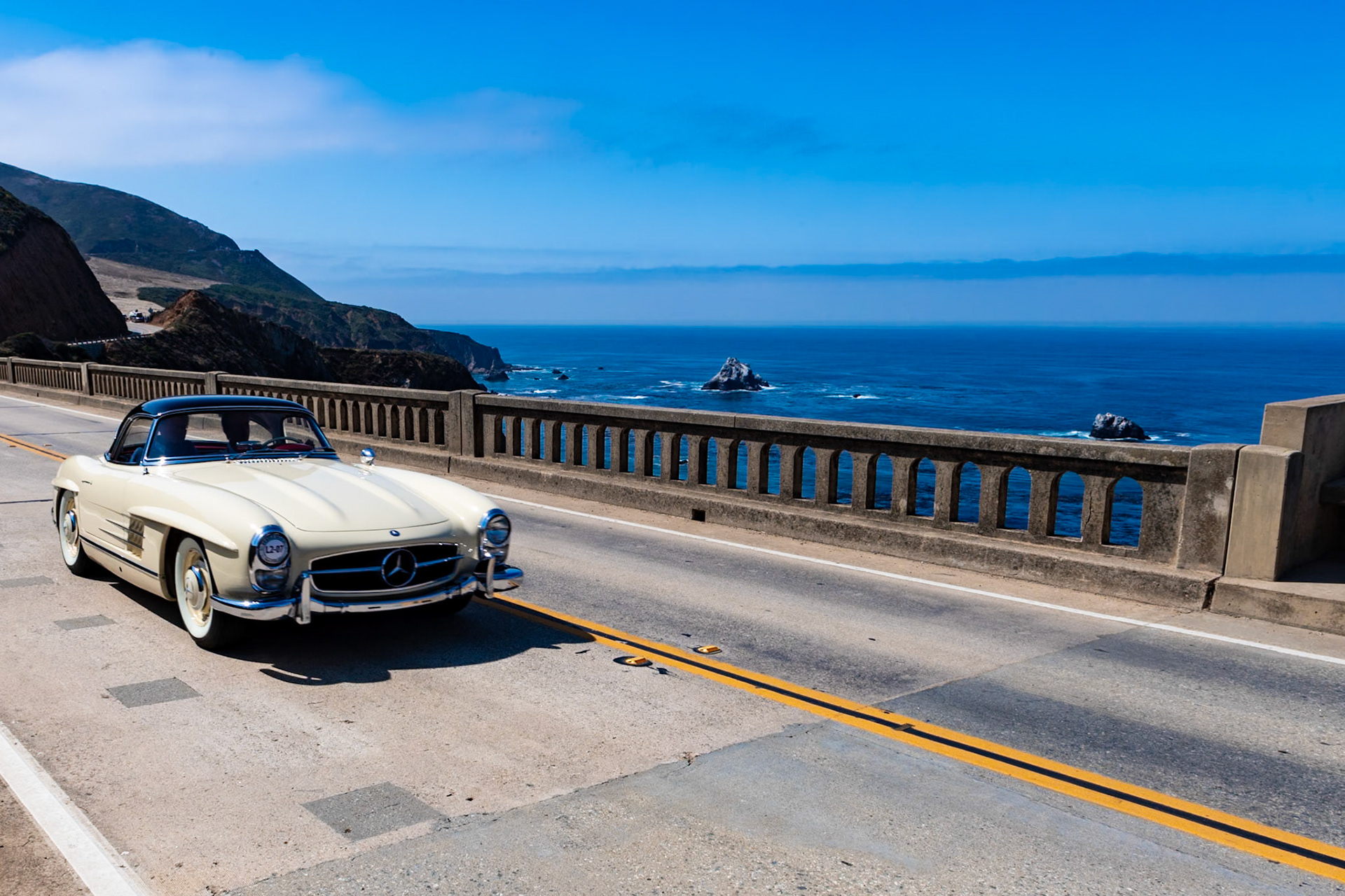 Introduced at the 1957 Geneva Motor Show, the Mercedes-Benz 300 SL Roadster was a completely re-engineered open-topped stablemate for the original 300 SL Gullwing Coupe. The 3.0-liter straight-6 fuel-injected engine remained but was boosted from 215 bhp to 225 bhp, and the chassis was redesigned with lower sills and more strength. The Roadster remained in production until early 1963, by which time 1,858 had been built. This 300 SL Roadster was purchased in Oslo, Norway, and delivered to its first owner, C. Jewett Henry of Pennsylvania, who drove it very rarely before his death in 1979. The car was later put into storage by Henry’s son. The Roadster with matching hardtop was acquired by its current owner in 2016.