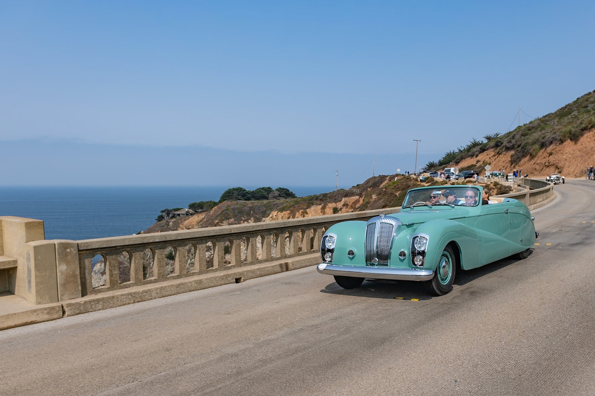 The Daimler DE36 was first made available to the public in 1946 and was offered in saloon, limousine and drophead coupé body styles. Daimler’s customers included the British royal family as well as the royalty of Afghanistan, Ethiopia, the Netherlands, Monaco, Saudi Arabia, and Thailand. A total of 205 DE36 chassis were built before production ended in 1953. This Daimler DE36 is the prototype and the first of seven similar cars with Hooper’s drophead coupé body, designed by Osmund F. Rivers. This drophead coupé was finished in a special jade green, and after the car was first shown at the 1948 London Motor Show, it was quickly nicknamed “the Green Goddess” by the motoring press. The car was often used by Daimler’s chairman, Sir Bernard Docker. While in Daimler’s ownership the car was continually modified and improved until, in 1953, the car was given a new Hooper-built body. The car remained in England until the end of the 1960s, when it was sold to an owner in the United States. The current owner bought the car in 2009.