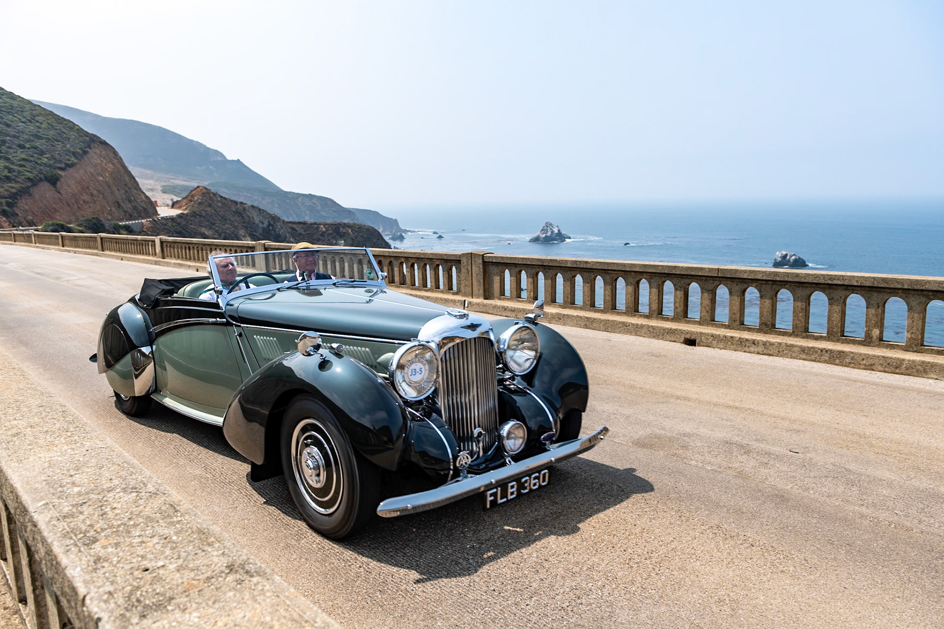 Alan P. Good, the new owner of Lagonda in 1935, recruited W. O. Bentley as his chief engineer to work on a range of engines and chassis. W. O. and his team designed an entirely new model, the Lagonda V12, which was built between 1937 and 1940. It is considered one of the finest V12-engined cars of the prewar era. The Lagonda V12 chassis featured independent torsion-bar front suspension and modern hydraulic drum brakes, and it wore bodywork ranging from open tourers to more formal limousines. Seventeen of the sportier Rapides were built on a shorter 124 inch wheelbase and had sleek drophead coupé coachwork penned by Frank Feeley and built in-house. This Lagonda Rapide is fitted with one of eight Le Mans specification engines, which featured four instead of two carburettors. In recent years it has had a ground-up restoration, and it has been shown at several events and driven on many rallies and tours.