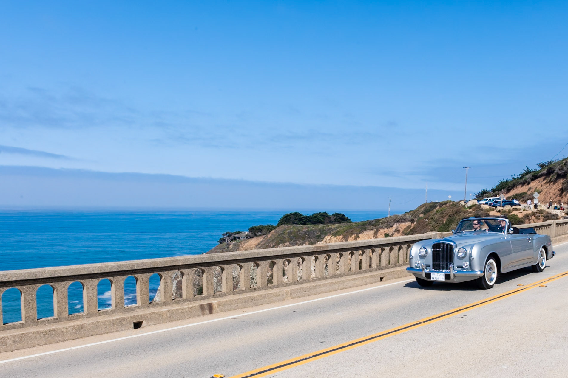 The Bentley S1 followed the R-Type in late 1955 and was one of the era’s most stylish motor cars. The Park Ward Drophead Coupé on this S1 (chassis BC25LDJ) is the work of legendary coachwork designer John Blatchley, famous for the Mulliner-bodied R-Type Continental. It is one of 31 left-hand drive aluminum-bodied drophead coupés by Park Ward, and it was ordered for H.R.H. the Crown Prince Abdullah of Iraq. Unfortunately the prince didn’t get to enjoy his new car as, soon after its delivery, he lost his life in the military coup of 1958. The car was acquired by Mr. Janabi, a Baghdad businessman, in 1968. The car attracted the attention of Saddam Hussein when it appeared in the 1990s film King Ghazi of Iraq, and after Janabi repeatedly refused to sell the car to him, it was forcefully “requisitioned.” In 2006, after the fall of Saddam’s regime, the car was found in his underground garage in Baghdad, having been neglected and badly vandalized. The car has now been restored to its former glory.