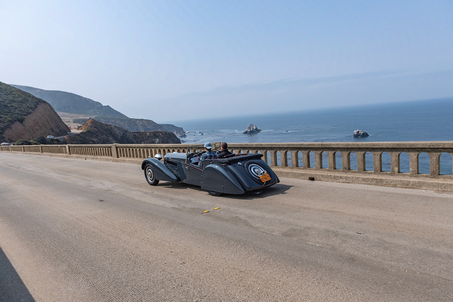 This Bugatti Type 57S (chassis 57541) was originally ordered from the marque’s London agent by American racing driver George Rand. The bare chassis was sent to Vanden Plas to build a sports tourer body similar in style to a Bugatti owned by Malcolm Campbell. The finished car was shipped to New York, where it was first driven in the A.R.C.A. races on September 25, 1937. Afterward, the car was shipped back to London to be sold, and it was shown on the Bugatti stand at the 1938 Olympia Motor Show. In 1947, Jack Robinson bought the car and exported it to Trinidad where, equipped with a Type 35B supercharger, it was raced by Robinson at the Trinidad Aerodrome. There it remained for more than thirty years before returning to England with British collector Peter Agg, who rebuilt it and regularly used it in vintage hill climbs and circuit races. Its current owner acquired the car in 2016 and has returned it to its original specifications, complete with its original Vanden Plas body panels and original engine.