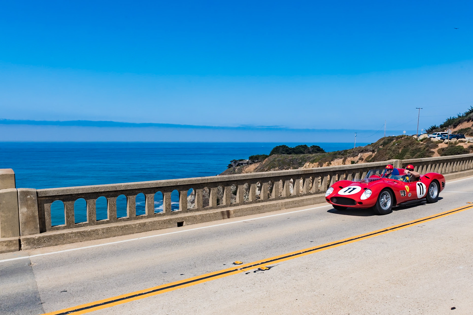 This Ferrari (chassis 0774 TR) was the fifth and final 250 TR59 constructed in 1959. It made its debut at the 24 Hours of Le Mans driven by Jean Behra and Dan Gurney, and it also ran in the Tourist Trophy at Goodwood driven by Phil Hill. After being updated in 1960 to new TR59/60 specifications, it won in its first time out at the Buenos Aires 1,000 km driven by Phil Hill and Cliff Allison. That June, Olivier Gendebien and Paul Frère drove the car to victory in the 24 Hours of Le Mans. It then moved to the United States where it was briefly raced again by Phil Hill. Following its own racing career, the car’s V12 engine was used for a time in another racing car. But car and engine were reunited in the 1980s, when owned by Paul Pappalardo, and the car was restored to its 1960 Le Mans–winning specifications. It was then raced throughout the 1990s. The current owner bought the car in 2004 and showed it at Pebble Beach in 2009 along with the other three surviving TR59/60s.