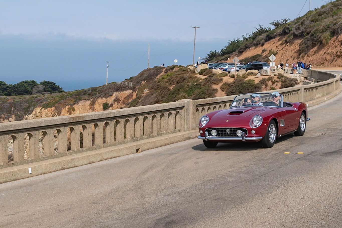 Two years after the first Spyder California was announced in 1958, Ferrari introduced an improved Spyder California, built on an 8-inch-shorter competition chassis from the Ferrari 250 GT SWB race car. Its V12 engine was uprated to the semi-competition Tipo 168 specification and, to cope with the increase in power, it was fitted with Dunlop disc brakes. Between 1960 and 1963, a total of 56 SWB Spyder California’s were built. The Pininfarina styling was almost identical to the earlier LWB model, the most obvious change being the air intake. Most SWBs also had covered headlights. The early history of this steel bodied car (chassis 3293GT) is not known, but in the mid-1960s it was driven for a short time by the comedian, film star and former guest host at the Pebble Beach Concours Bob Hope while he was touring in Europe for the United Service Organization. In 1975 the car was imported to the United States by racer and sports car collector Harley Cluxton. After it crisscrossed the Atlantic between additional owners, it landed in New Jersey with its current owner in 2007.