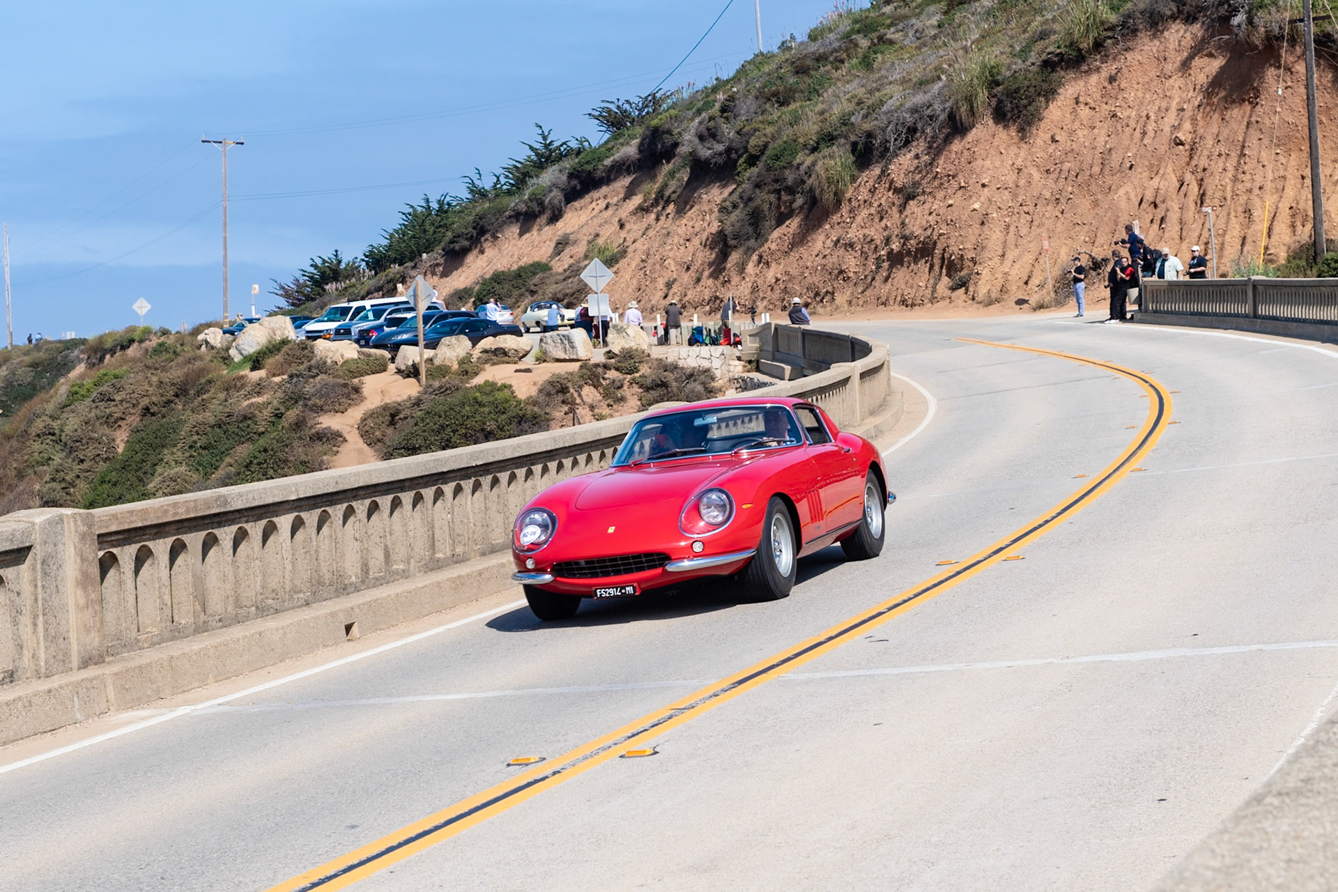 In 1966 Ferrari launched the 275 GTB/C Berlinetta Competizione, which was built on a completely new chassis designed specifically for this model. The chassis, designated Tipo 590A by the factory, was lighter and stronger than the standard 275 chassis. This car (chassis 09067) is the ninth of twelve Ferrari 275 GTB/C Scaglietti Berlinetta Competizione cars built by the Ferrari factory that year. It retains all of its original components as well as the lightweight chassis and aluminum body panels. The car is presented in its original livery, with cast-aluminum wheels, FISPA air cleaner, and black leather and cloth seats that are rarely seen on Ferrari 275 GTB/C cars.