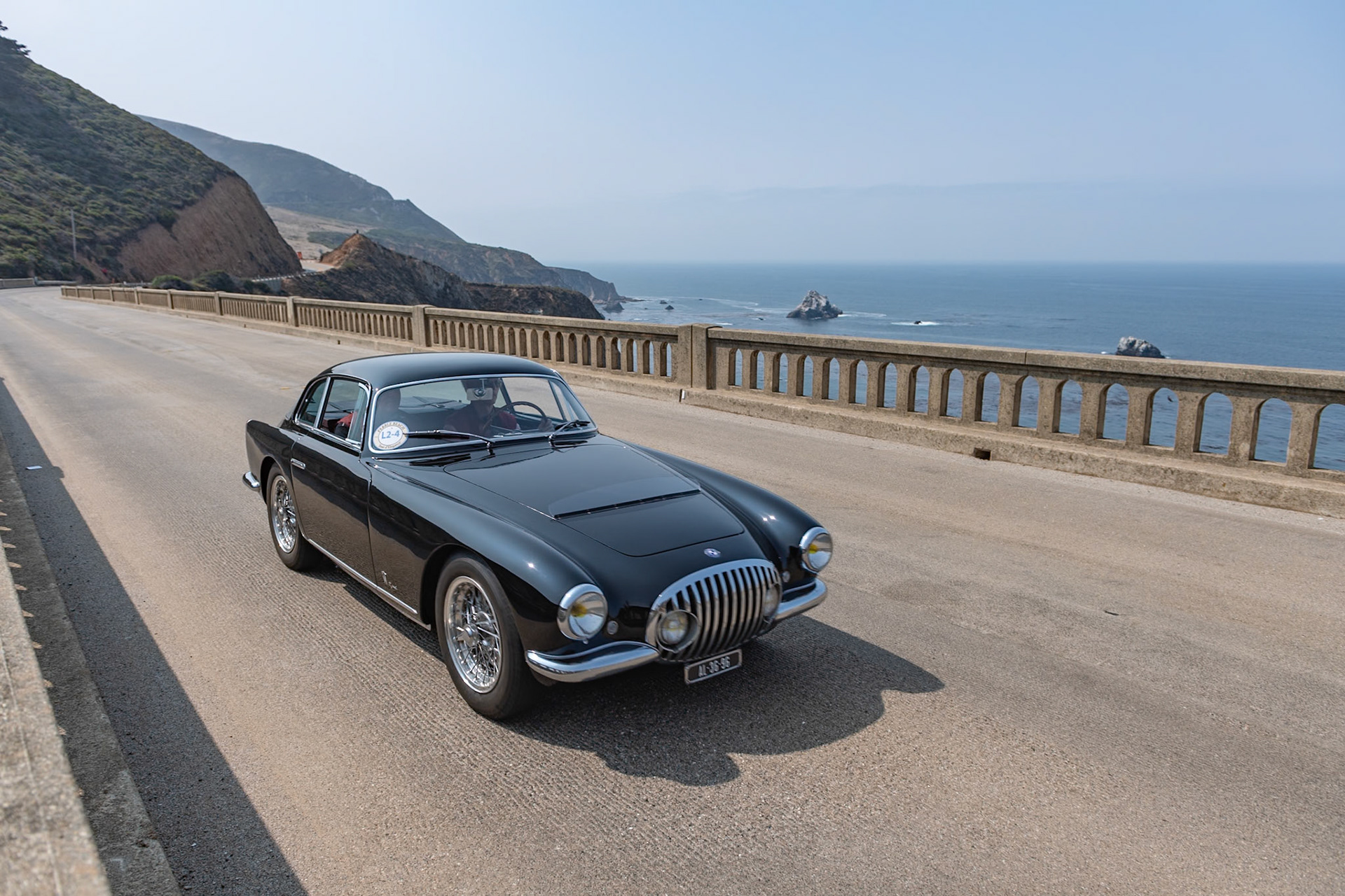 First shown at the 1955 Turin Motor Show, this is one of four road-going MT4s built at the OSCA factory, and it is the only MT4 2AD 1500 Berlinetta with coachwork by Vignale. The car still has its original oxblood leather interior and its original Nardi steering wheel with a hand-painted OSCA badge, as well as the car’s original three-piece fitted Swiss luggage. It features unique taillights cut into dozens of facets so the light reflects like rubies. The original jack and canvas tool bag are still with the car, with its chassis number (1153) painted on the fabric. The instruments feature a prototype Jaeger fuel gauge with nine tiny bulbs that glow red to show fuel level. The car remained in Europe for almost 50 years until it was brought to America by Jack Thomas. The current owner bought the car twice—first in 2010 and again in 2016 after it was owned by OSCA collector Elad Shraga.