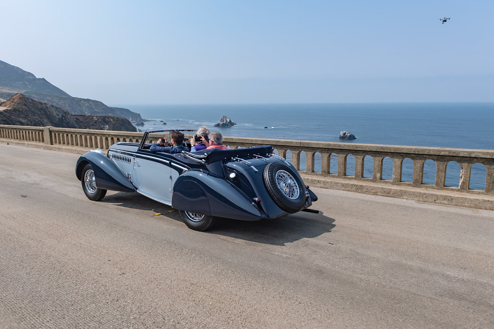 The Delahaye 135 M (Modifie) was based on the original Delahaye 135 first shown in 1935. Combining luxurious bodywork with Delahaye’s race-winning engineering, the Delahaye 135 M is one of the most desirable cars from the prewar era. This 1937 Delahaye 135 M Convertible Coupé (chassis 48700) is from the French Carrosserie Henri Chapron. Built on Delahaye’s shorter competition chassis, it has a 95-hp 3.5-liter engine fitted with triple Solex carburetors. The sporty body with its sharply raked one-piece windshield sits low to the ground and features beautifully sculpted teardrop fenders accented by round vents on the side of the hood and a chrome beltline moulding that extends from the radiator surround back through the doors before falling smoothly off at the tail. The car has just been restored by its current owner.
