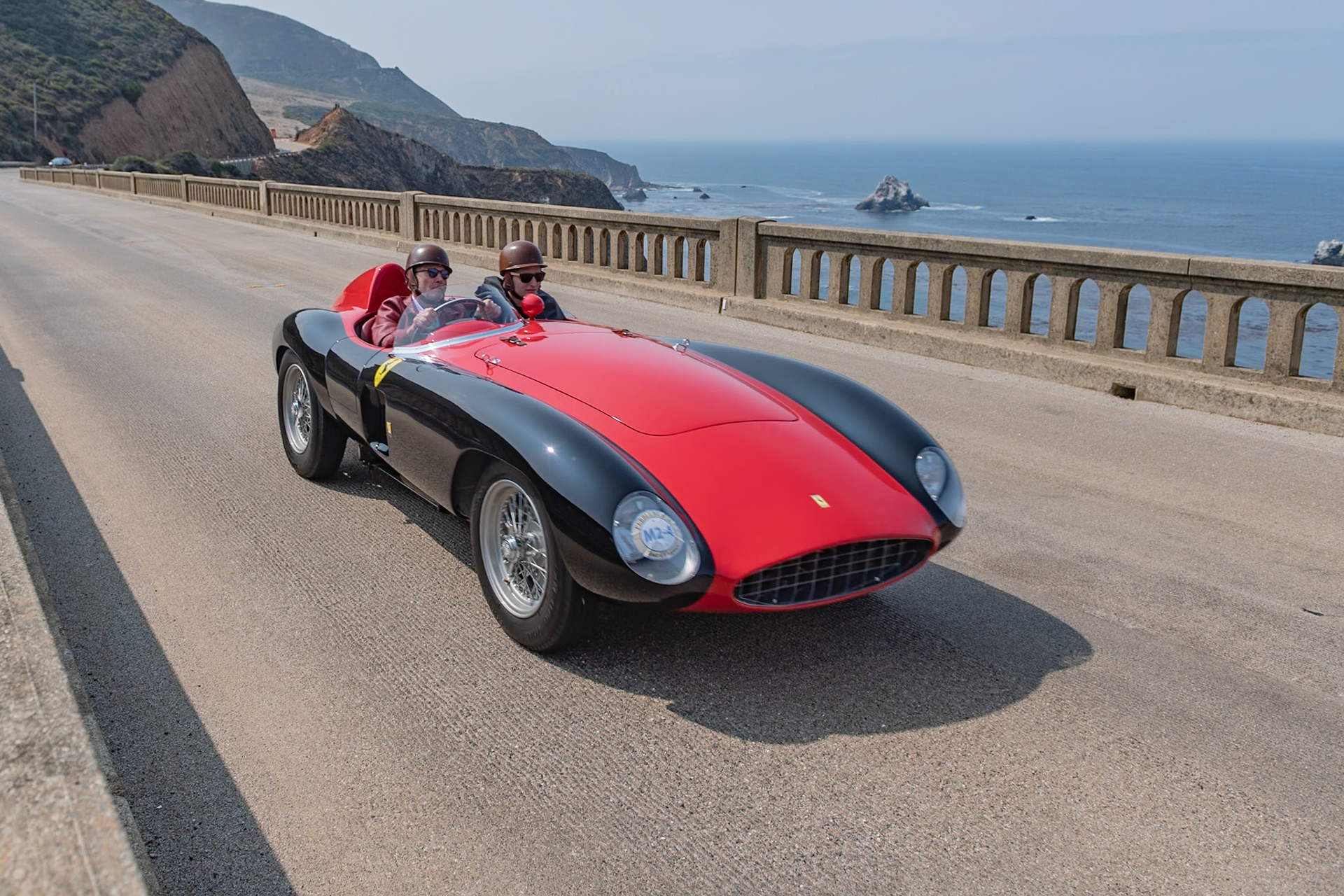 The Ferrari 500 Mondial used a new 4-cylinder engine developed by Ferrari’s chief engineer, Aurelio Lampredi. The 4-cylinder layout had better low-end torque than Ferrari’s V12, allowing for more acceleration out of corners, and its lighter weight provided better handling. At its first race, the 12 Hours of Casablanca in December 1953, factory drivers Alberto Ascari and Gigi Villoresi finished first in class and second overall, and the model went on to play an integral role in winning Ferrari’s second Sports Car World Championship in 1954. This car (chassis 0580MD) is a second series Mondial built by Sergio Scaglietti. First shown in Stockholm, Sweden, in 1956, it was raced throughout Scandinavia, often on ice-circuits wearing spiked tires, until 1960. Once its ice-racing career was over, it was sold to Claudio Caggiati in Italy who entered the car in a record-breaking 17 Mille Miglia retrospectives. Its present owner bought the car at the end of 2014 and has now restored it to its Stockholm Auto Show condition.