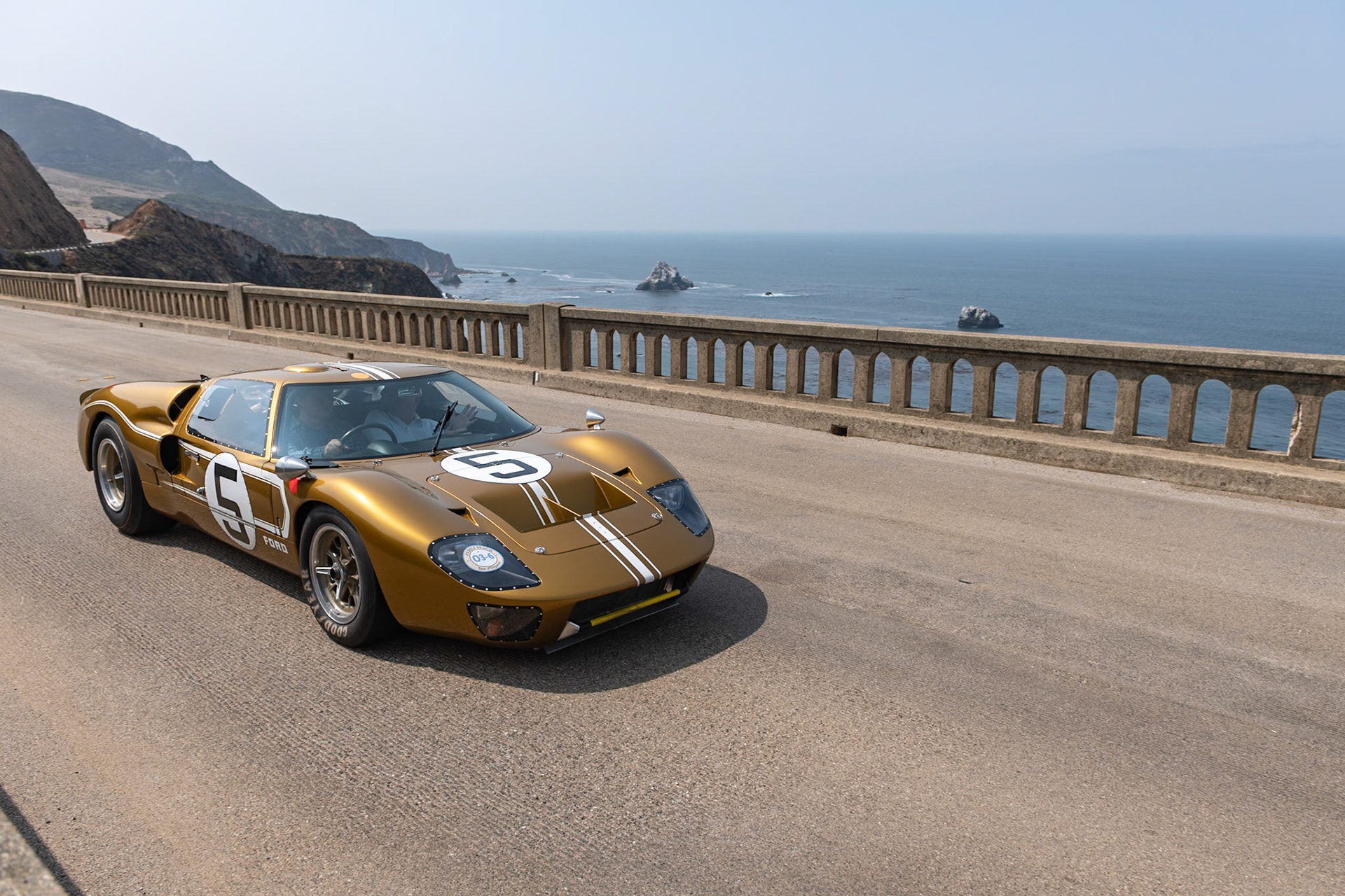 The Ford GT40 Mark IIB was the final and most sophisticated version of the legendary GT40 race car, and this is one of only two surviving examples. At the 24 Hours of Le Mans in 1966 this GT40 (chassis P/1047), driven by Dan Gurney and Jerry Grant, was favored to win. Sadly, at just over 17 hours, the car blew a head gasket and retired. The next race for the car was at Daytona, then it appeared again at Le Mans in 1967, prepared by Holman and Moody, painted gold, and driven by Frank Gardner and Roger McCluskey—but again the car retired, this time after 13 hours. After that race, the car was shipped back to Holman and Moody, who stored it until 1972, then it was sold to a Japanese collector who kept it unused for another 40 years. In 2009 the car was shipped to the United States for a full restoration, which was completed in 2012.