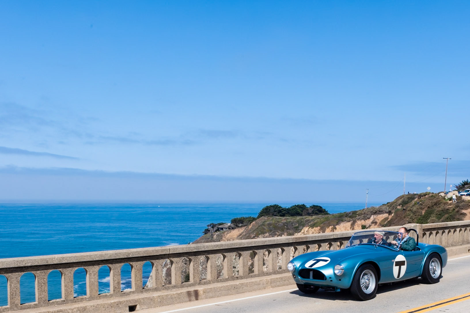 This car (chassis CSX 2005) is the fifth Cobra built; the AC factory listed its build date as July 17, 1962, and it was invoiced to Shelby American that September. It was featured in the 1964 film The Killers, a Universal Studios production based in part on a short story by Ernest Hemingway and starring Lee Marvin, Angie Dickinson, Ronald Reagan and John Cassavetes. In 1964 it was sent to the newly opened Carroll Shelby School of High Performance Driving at Riverside Raceway, where it was driven by many aspiring celebrity race drivers, including Steve McQueen and James Garner as well as a Miss Universe. Here the Roadster is presented in its school uniform of light blue metallic paint complete with its distinctive large letter T for Trainer. Its original body panels and hand-stamped and numbered fittings have all been restored to be exactly as the car was when running around Riverside Raceway.