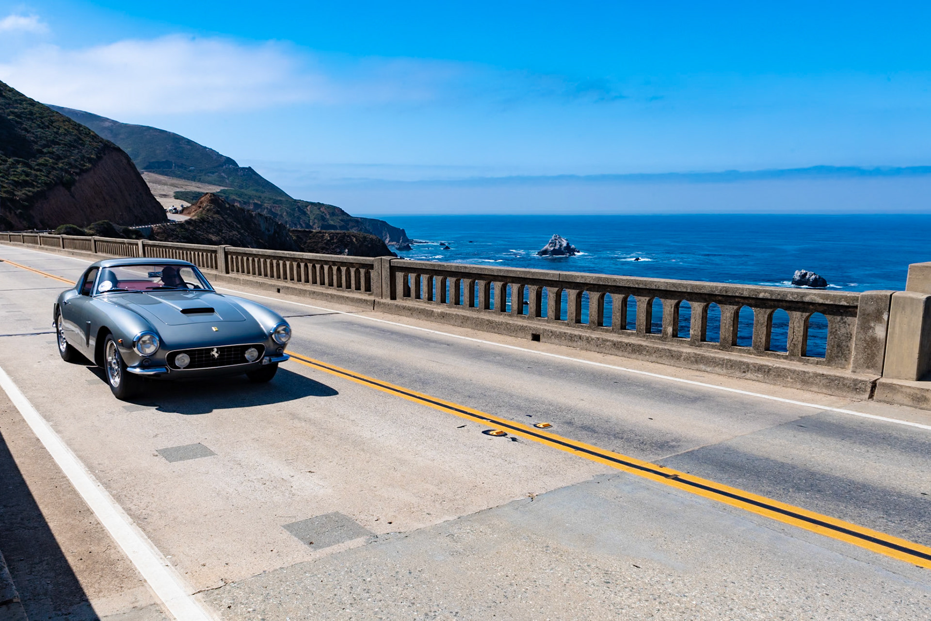 The Ferrari 250 GT SWB Berlinetta was one of the last Ferraris designed as both a grand touring car and a race car. A total of 165 of these berlinettas were built between 1959 and 1963, seventy with aluminum coachwork and the rest in steel. This example (chassis 2243GT) was the first of ten steel-bodied cars built as homologation cars on the competition frame. It was also the first 250 GT SWB with the window vents that were included on all the later cars. This important Ferrari has been cared for by eleven owners during its lifetime, including John Lundin, a founder of the Ferrari Club of America. The current owner has returned the berlinetta to the condition it was in when first delivered to Luigi Chinetti.