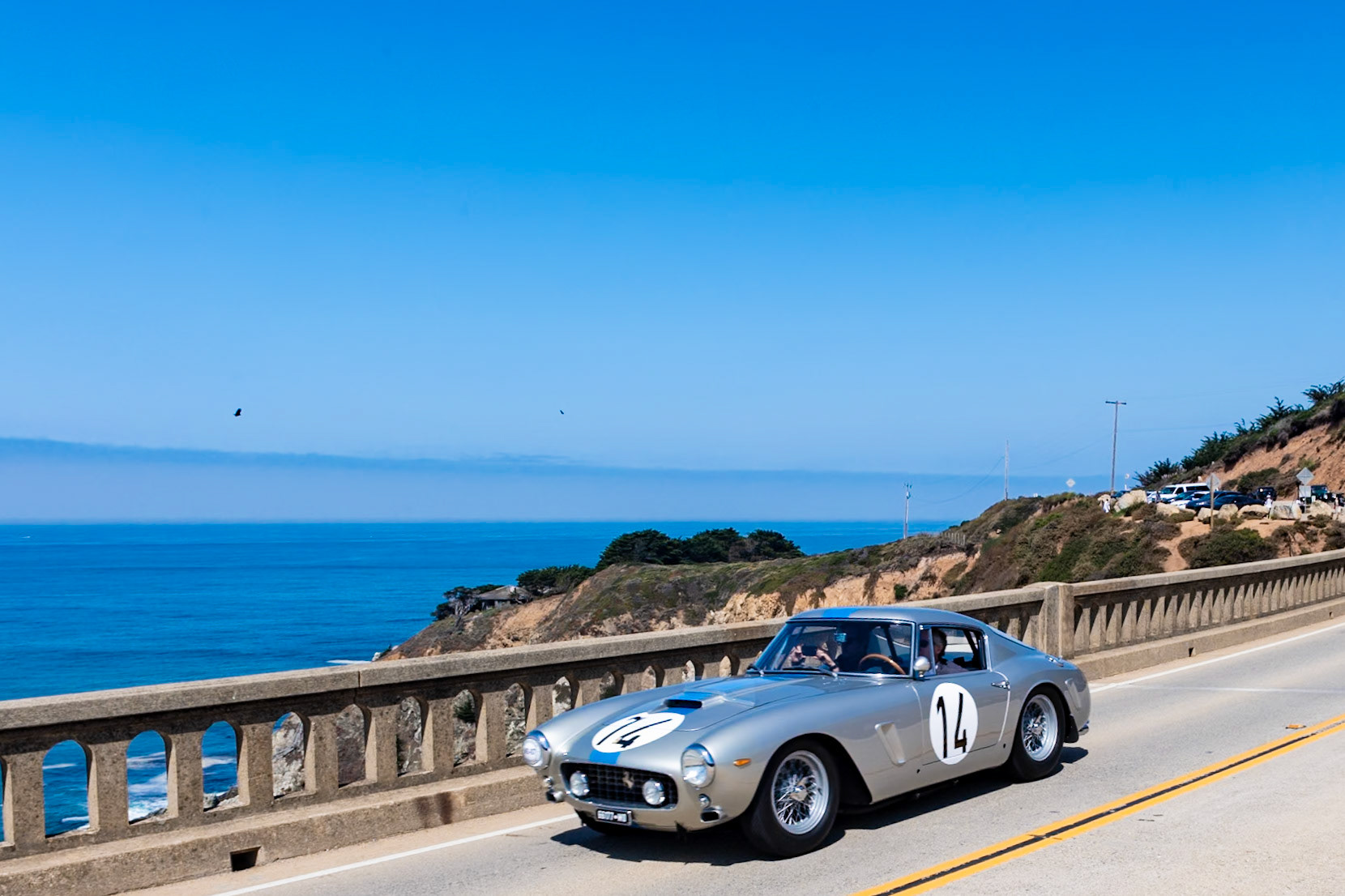 In 1961 Ferrari launched the ultimate 250 GT SWB, often referred to as a SEFAC Hot Rod but also known more formally as the Comp/61. A few of the 250 SWB Competiziones also received a mechanical makeover for the 1961 season. At the time there was little competition that could rival the SWB in the GT class, and it often beat the Jaguar E-type and Aston Martin DB4 in sports car races. This car (2689GT) is one of the most famous of the 20 alloy-bodied SWBs. It was driven to third overall and first in class at the 1961 24 Hours of LeMans by Pierre Noblet and Jean Guichet. They continued to race the car and racked up what is probably the most desirable of race records among all the SWBs.